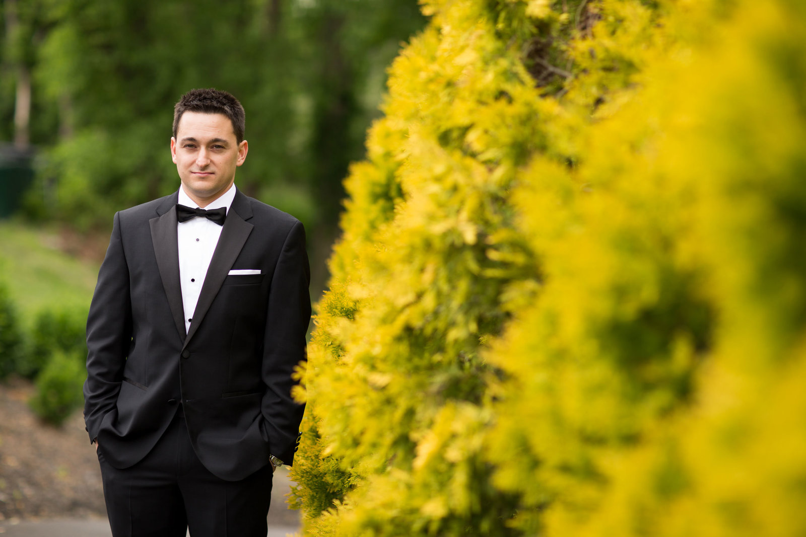 handsome groom waiting for his bride at Engineers Country Club