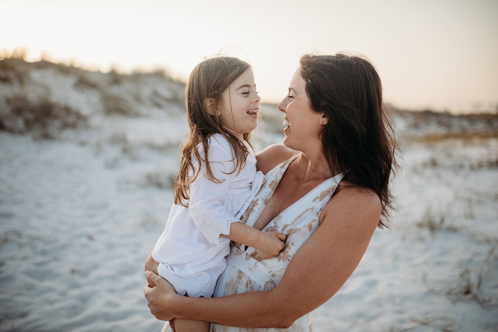 Mother and daughter family photo session at Johnson Beach in Perdido Key, FL