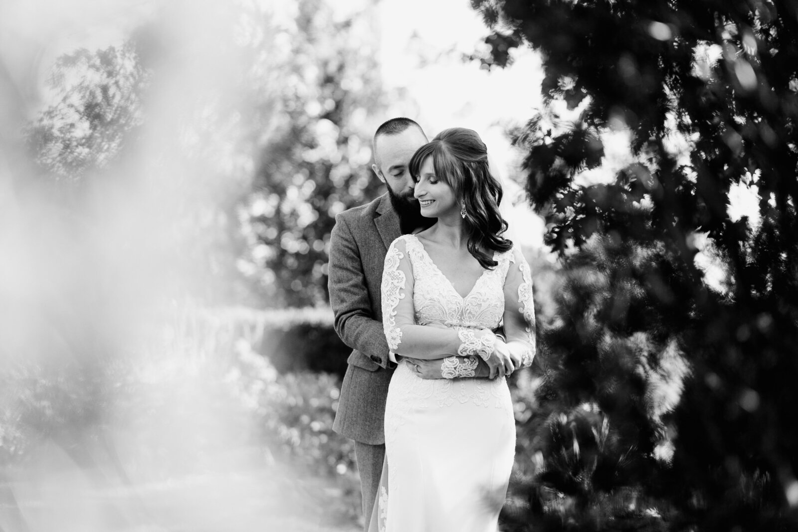 black and white couple hugging nature