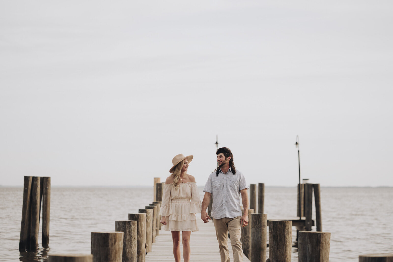 Engagement photo on a dock near Chesapeake Bay