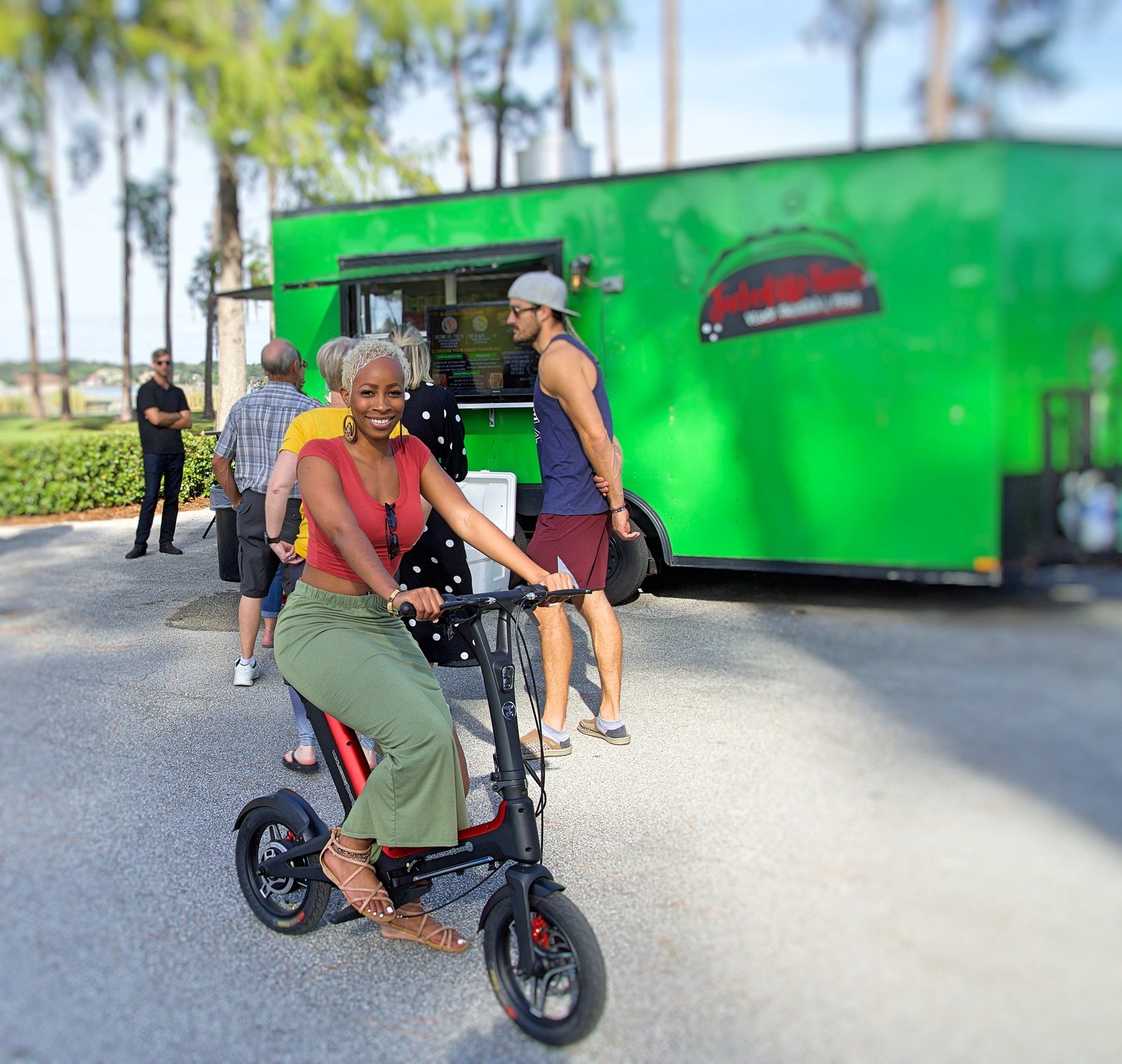 Red Go-Bike M3 with green food truck