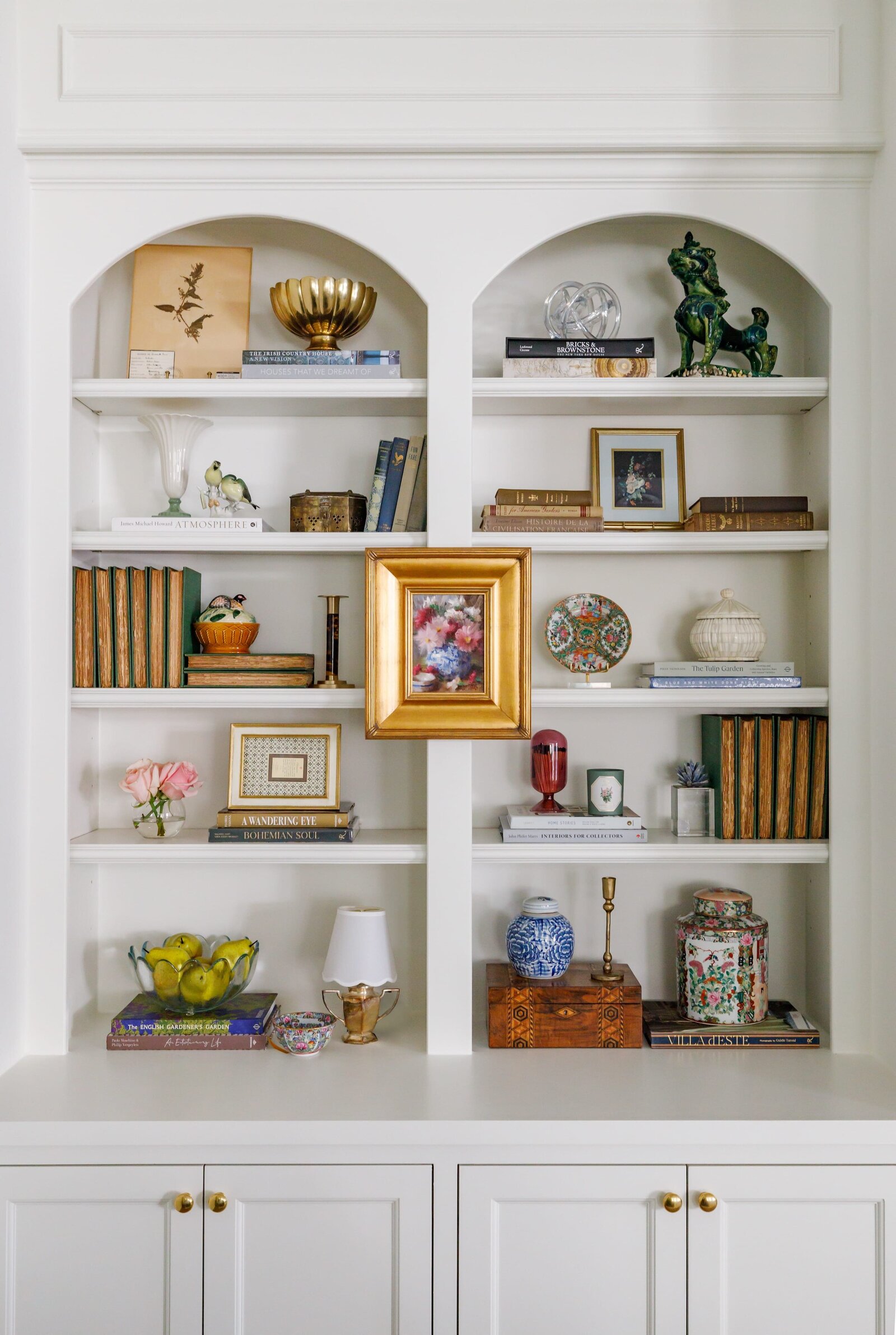 vision and hammer styling shelf with arched white builtins