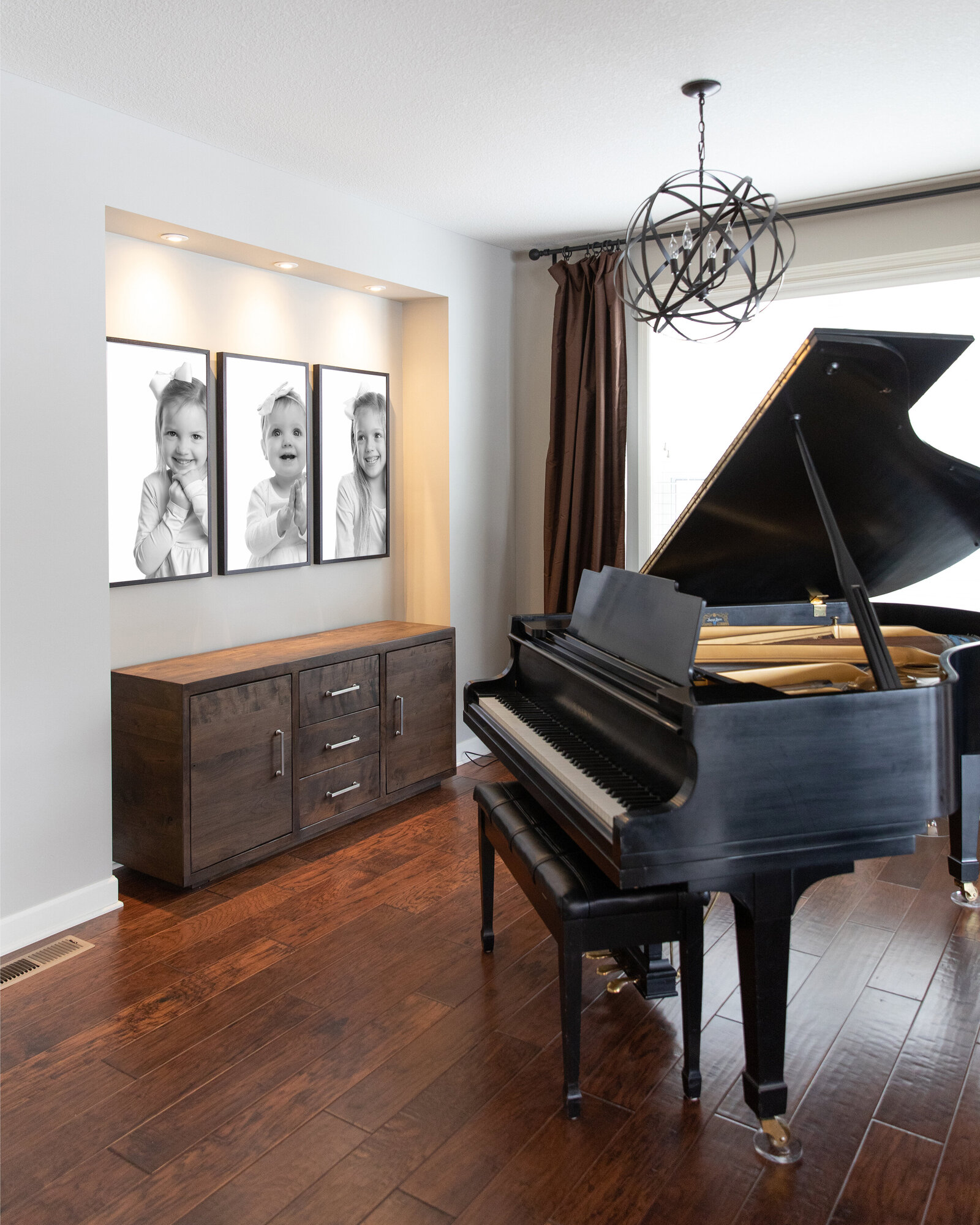 three-kids-framed-in-piano-room