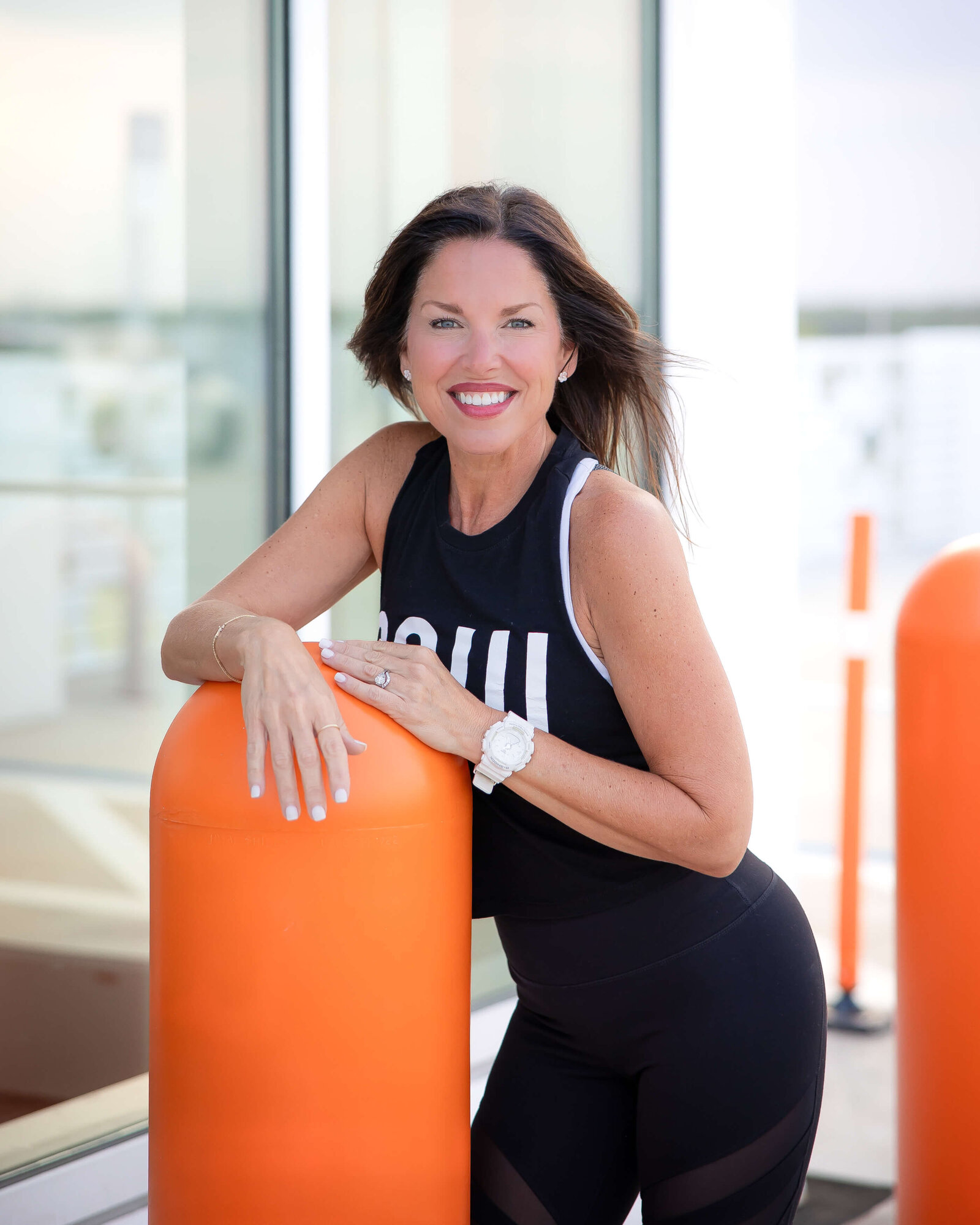 Personal branding photoshoot for a fitness professional in Orlando, Florida. Outdoor natural light session showcasing confident, vibrant poses.