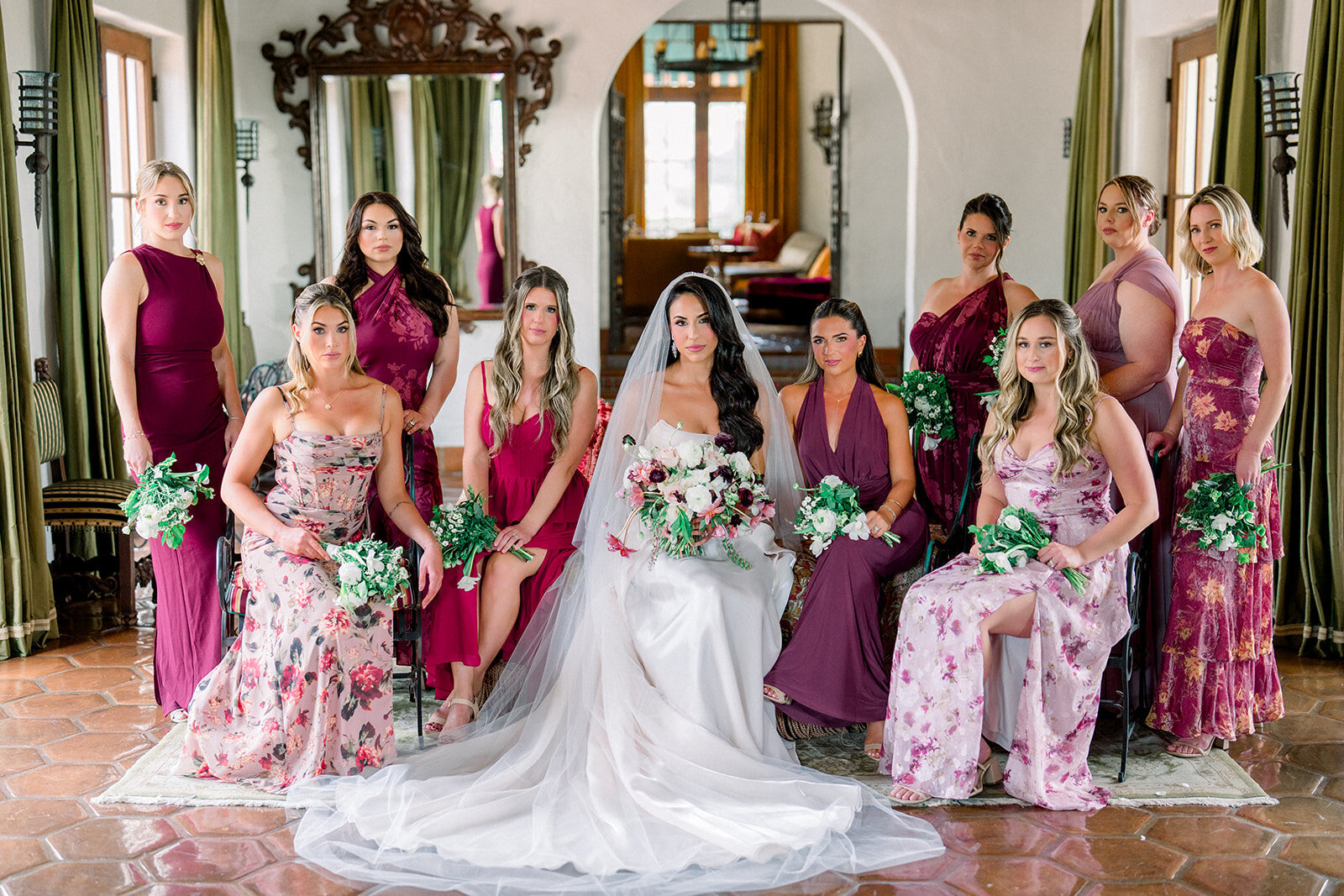 Bride and bridesmaids in bold floral robes before getting ready, captured in a candid, film-inspired moment in Simi Valley.