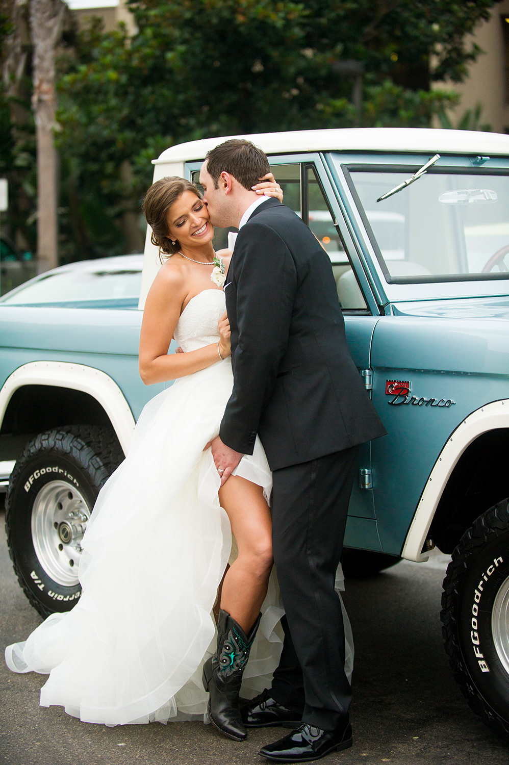 bride and groom with old truck at the dana
