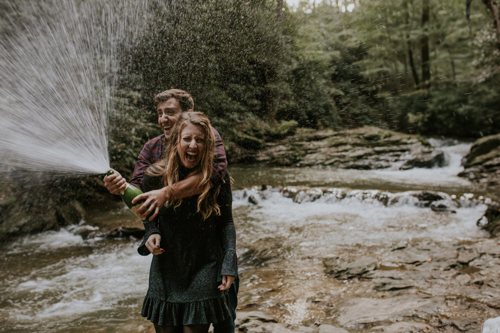 Williamsport couple engagement session champagne explosion