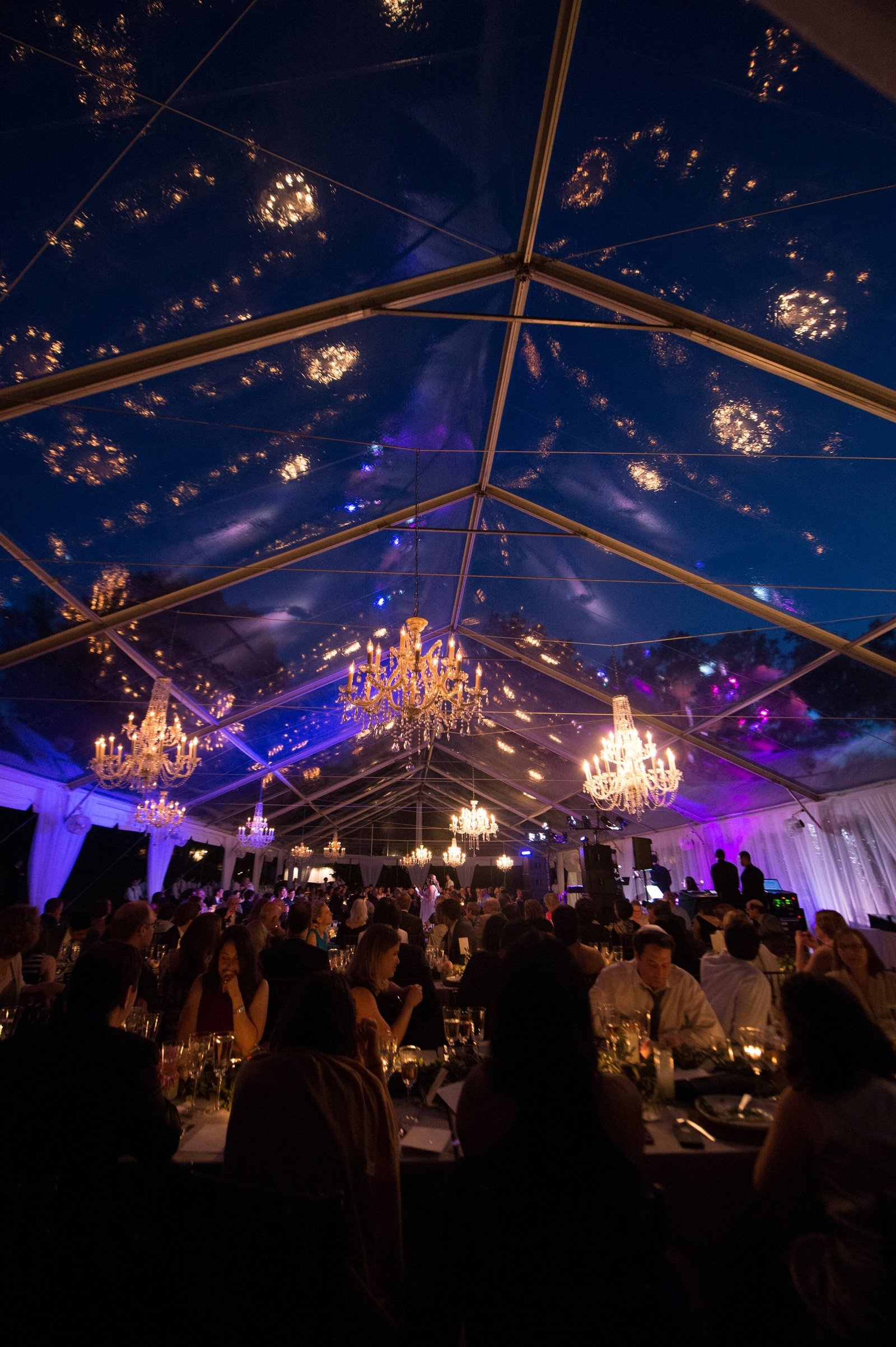 Clear top wedding tent with crystal chandeliers for home wedding in Washington, CT