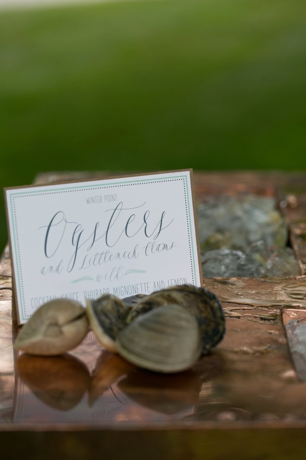 Oyster cocktail hour station via Eventide for rustic wedding at The Barn on Walnut Hill in Maine