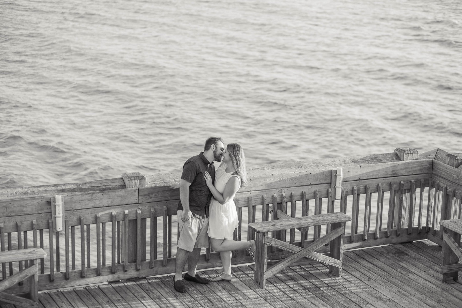 Engaged Couple on fishing pier, Folly beach in Charleston, South Carolina