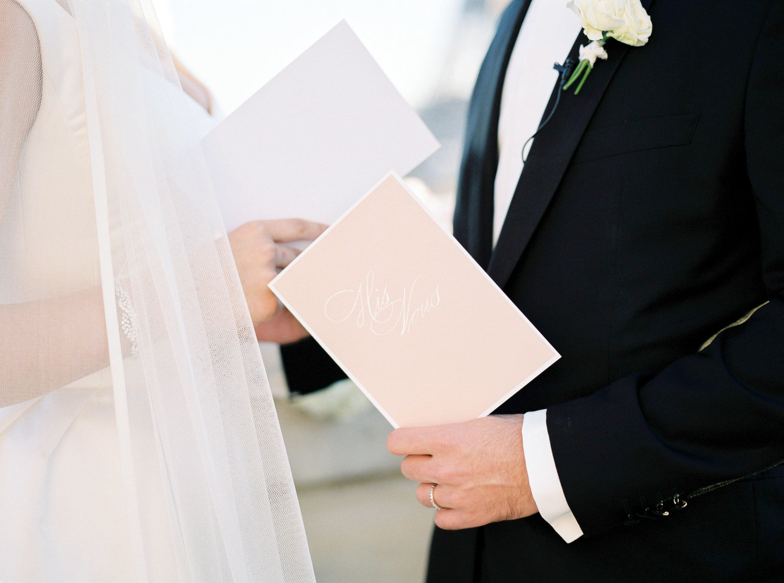 Blush and white wedding vow booklets