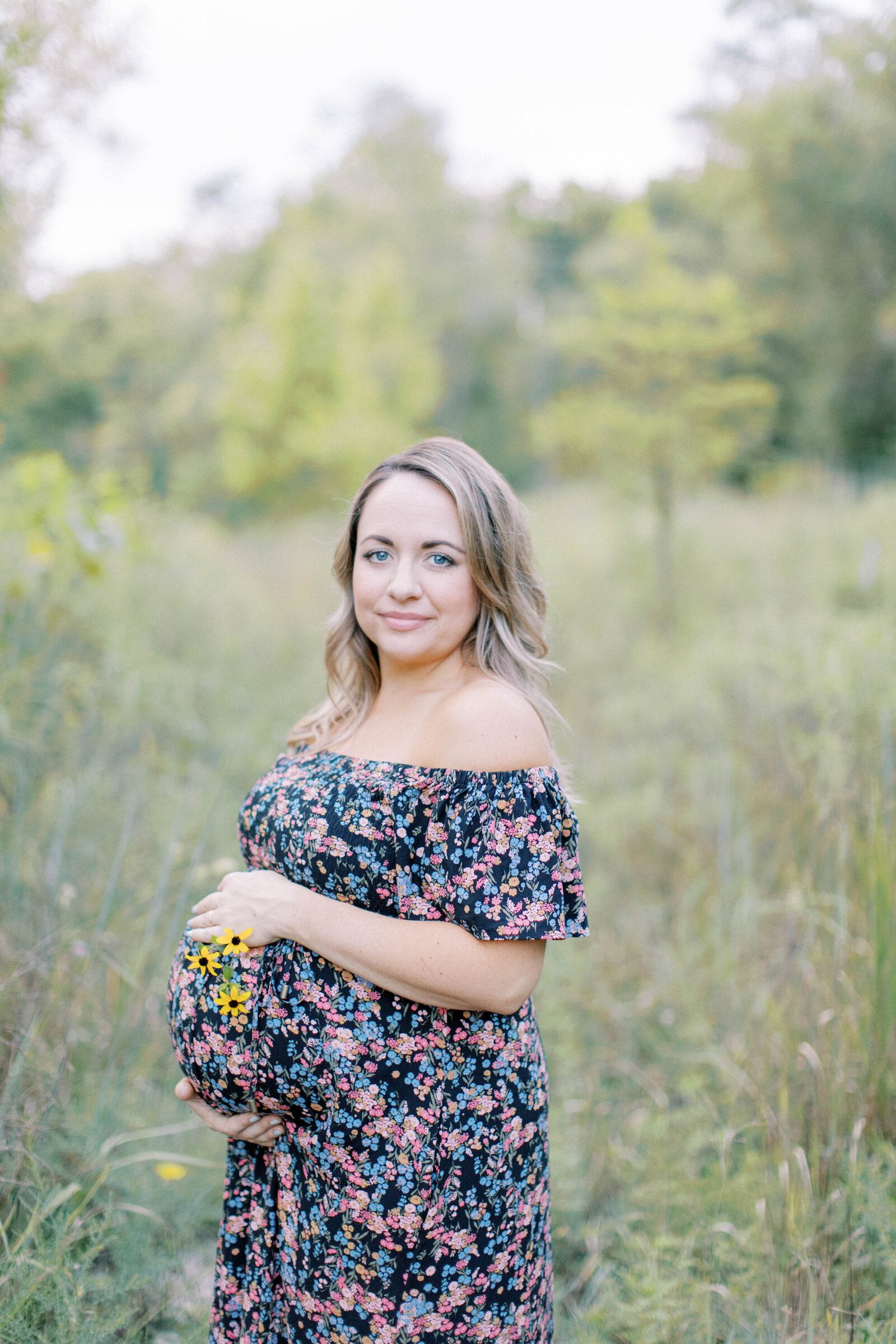 Floral wildflower maternity photos at Hartman Memorial Park in Less Summit