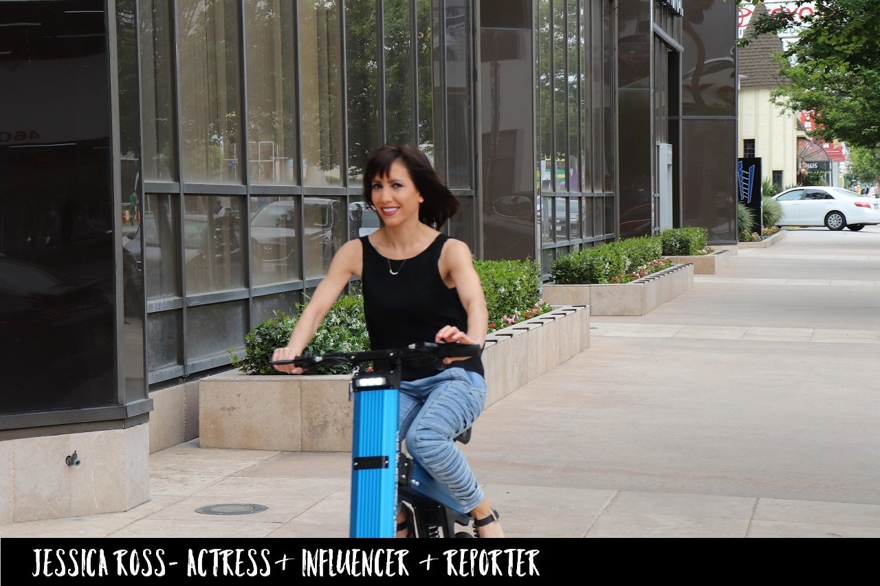 Actress Jessica Theodorou cruising around the streets of LA on a Blue Go-Bike M2