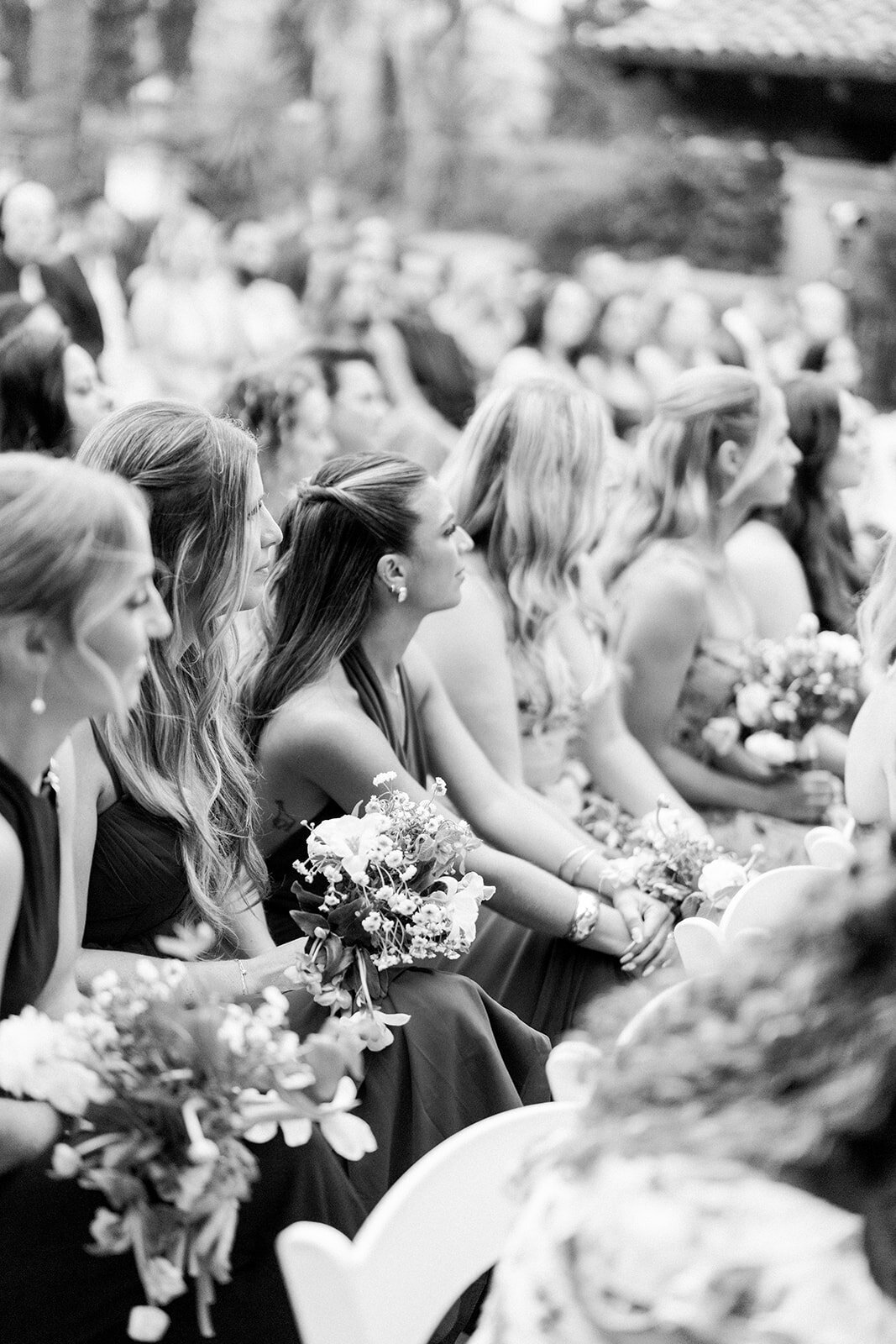 legant black and white film portrait of bride and groom embracing during a fine art wedding at Hummingbird Nest Ranch.