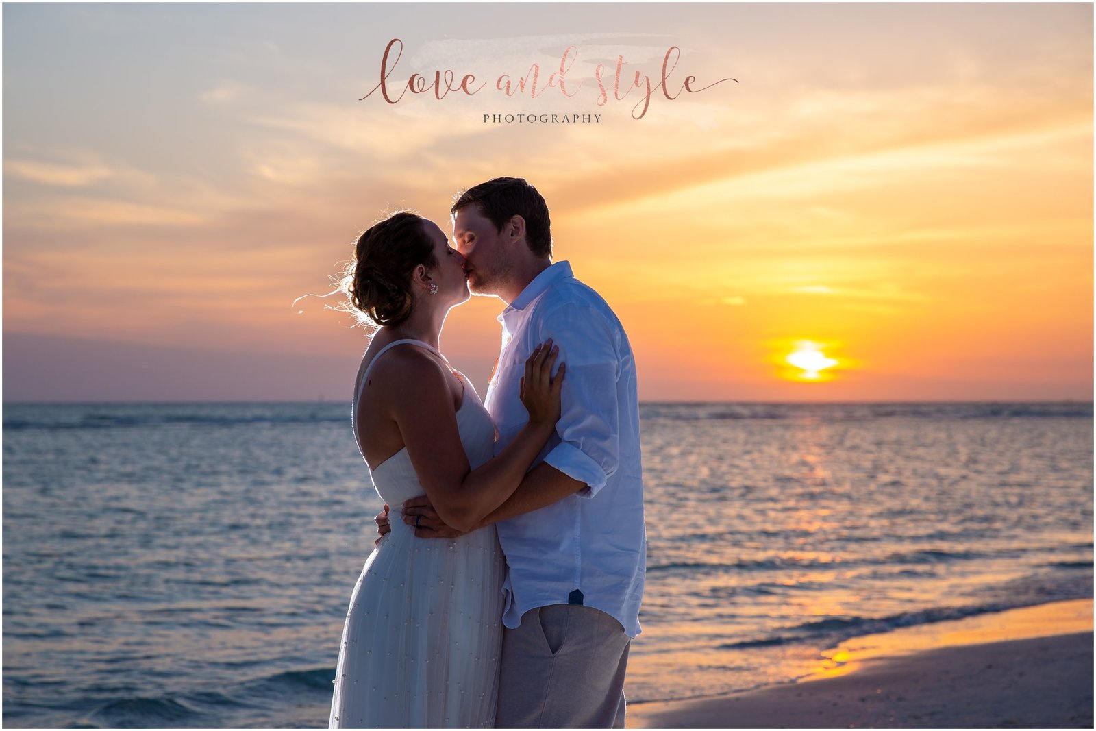 Lido Beach Wedding Photography of bride and groom kissing at sunset