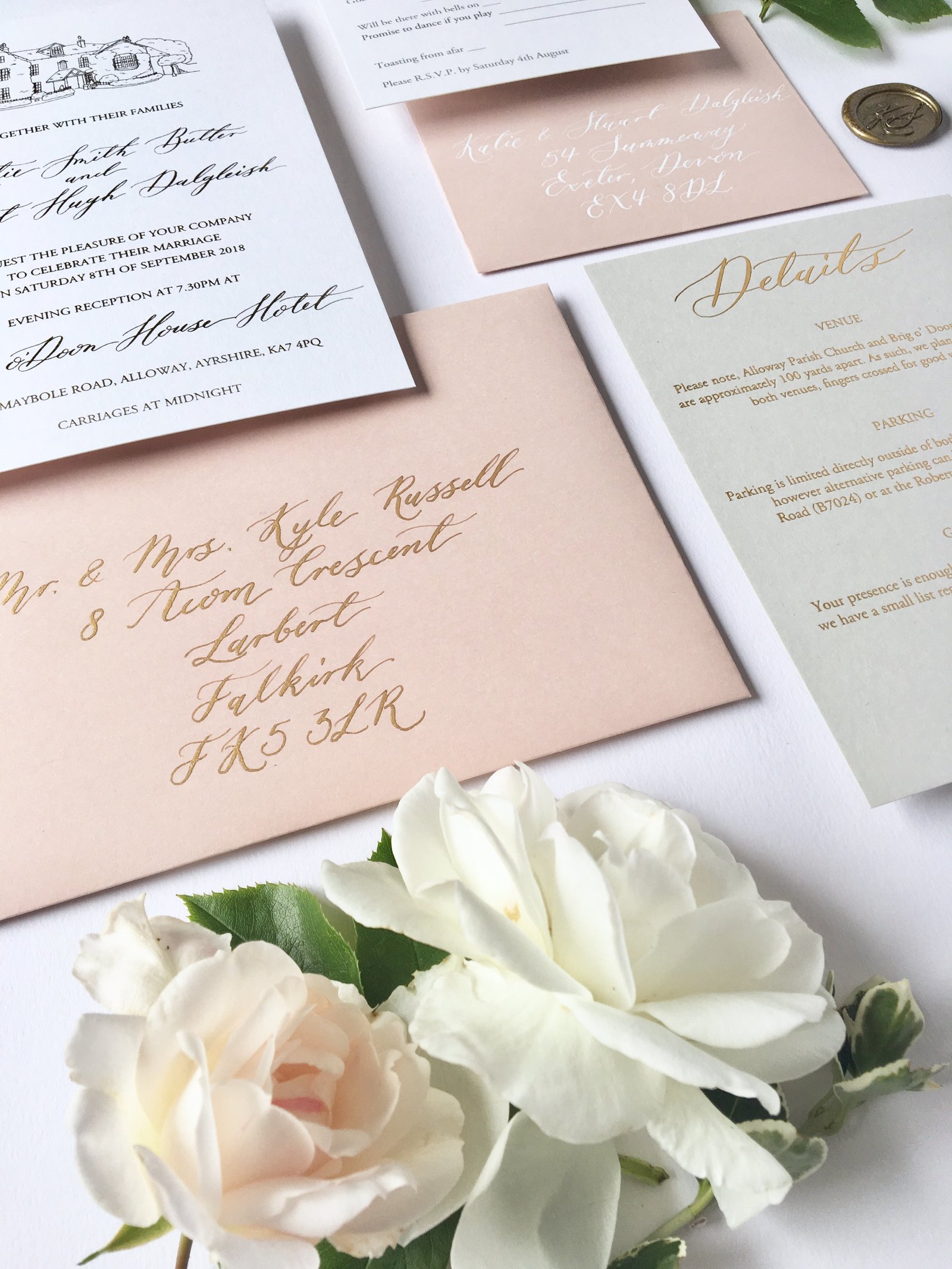 Blush and gold wedding invitation envelopes