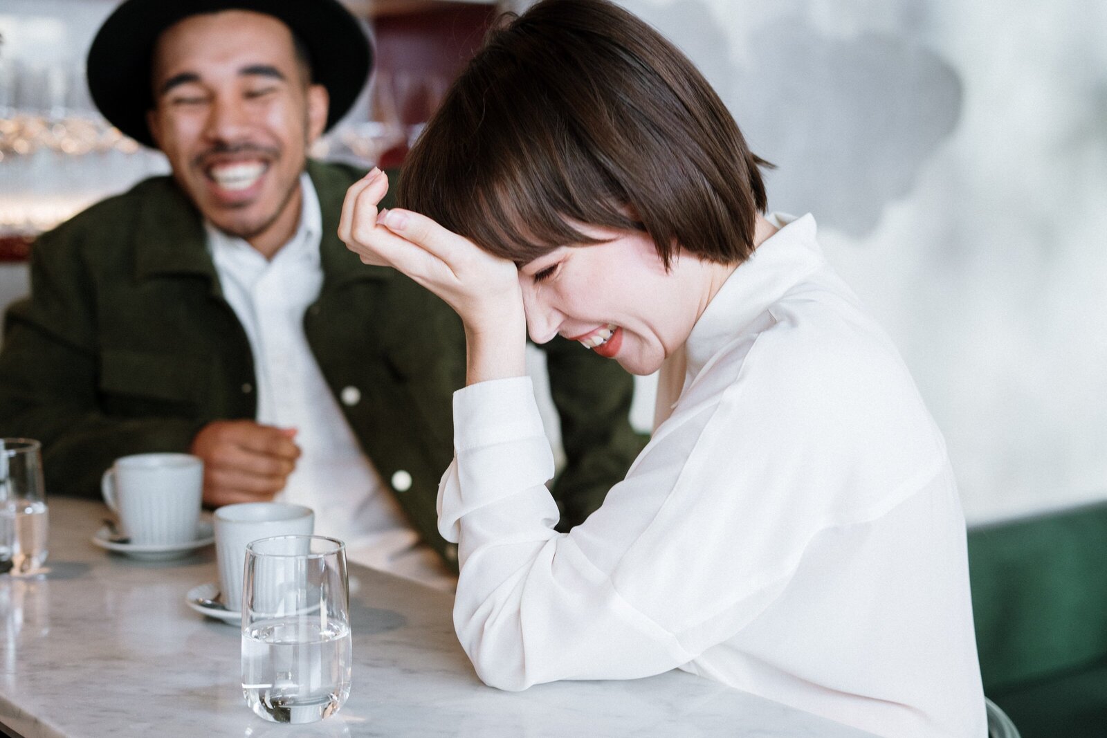 woman-in-white-dress-shirt-holding-clear-drinking-glass-4255394