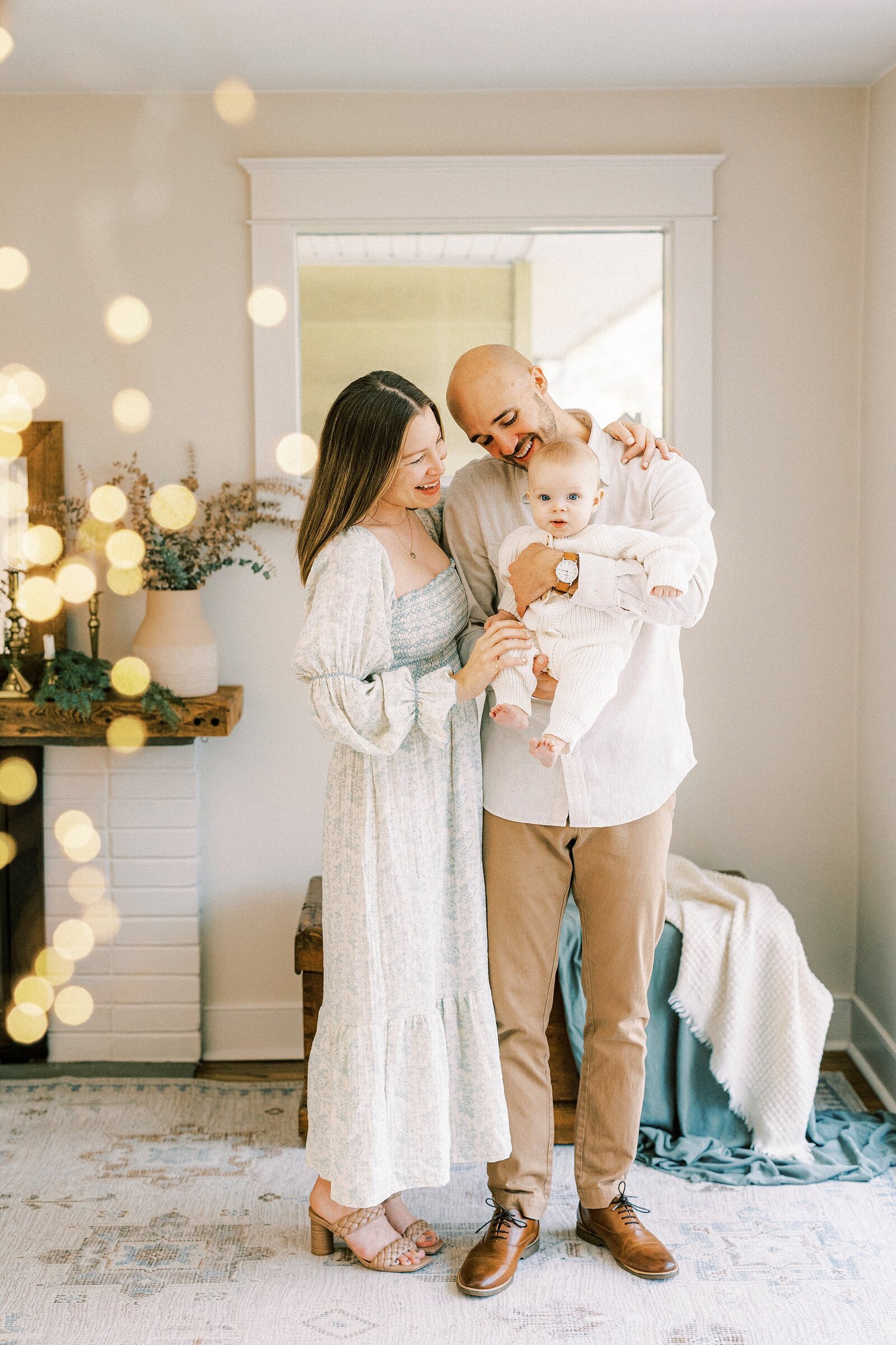 in home portrait of parents and baby by Philadelphia Family Photographer