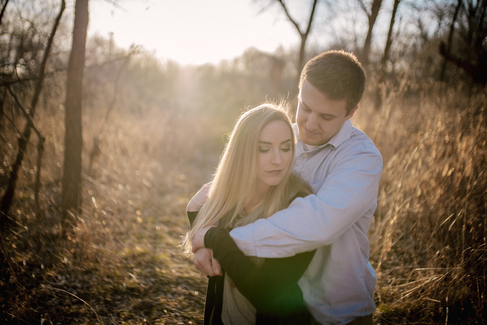 couple in romantic pose at golden hour