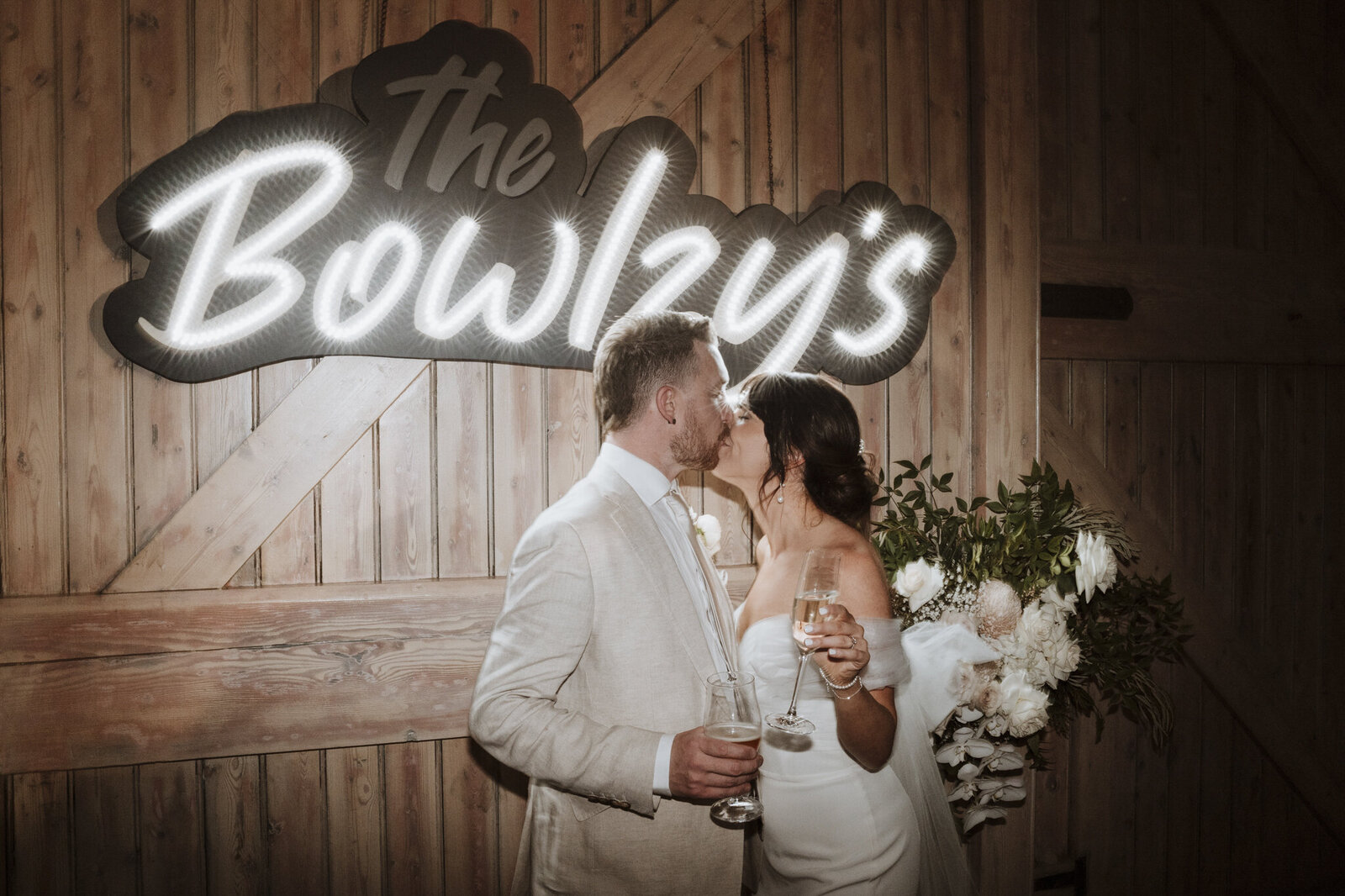 A couple kissing at their wedding at the farm yarra valley
