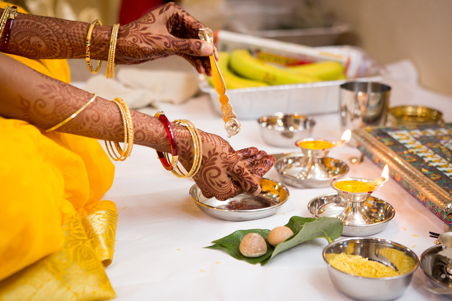 Close up of a Hindu Indian bride's hands during a wedding ceremony