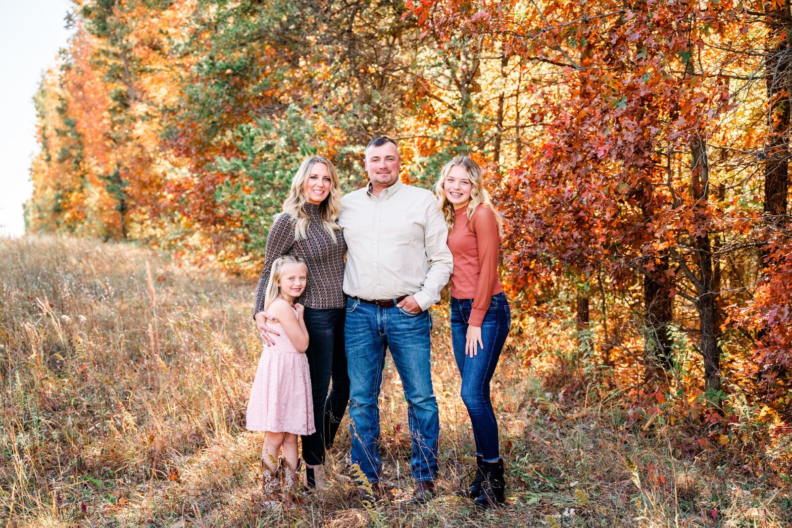 Family in fall forest