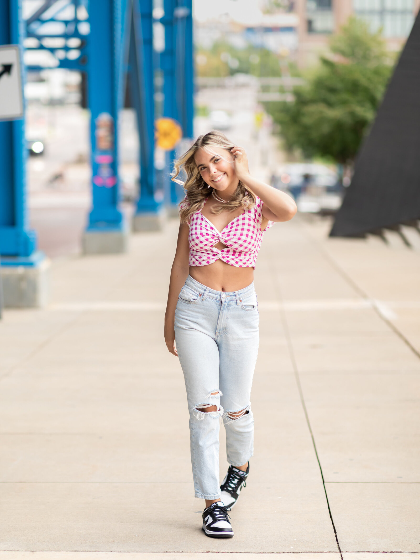 high school senior posing for photos in downtown cleveland