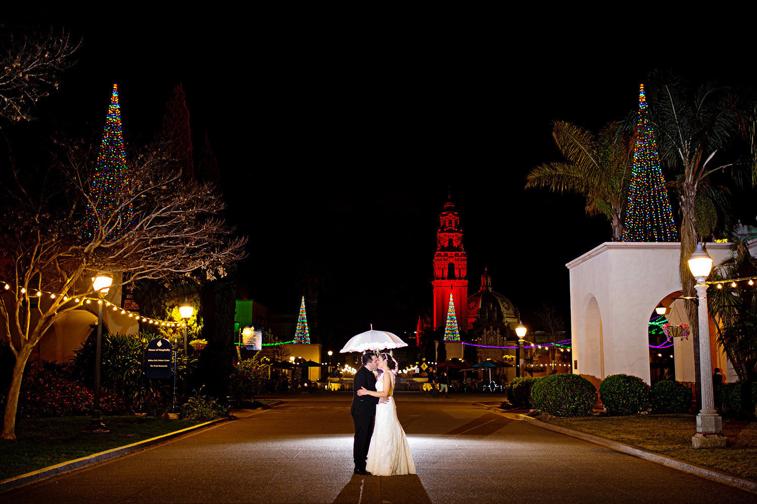stunning night shot at balboa park prado wedding with sparklers