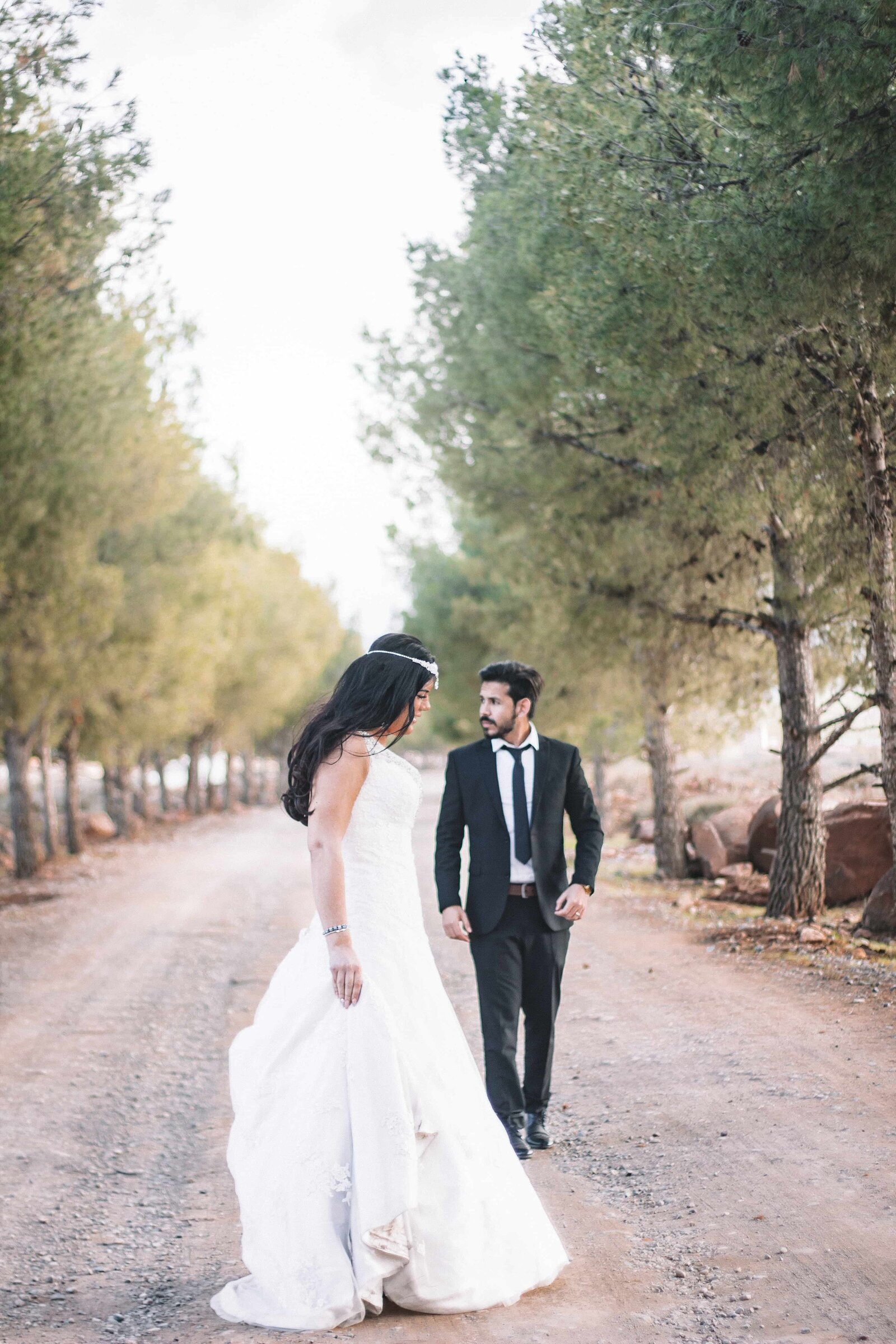 bride-and-groom-strolling-in-park