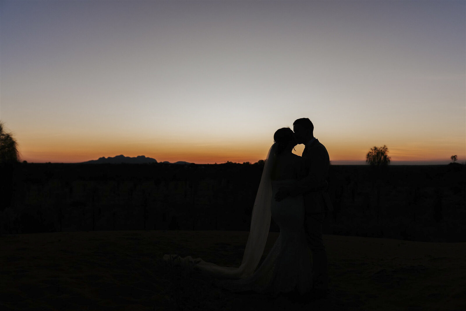 Sunset wedding at Uluru by Ada and Ivy Photography