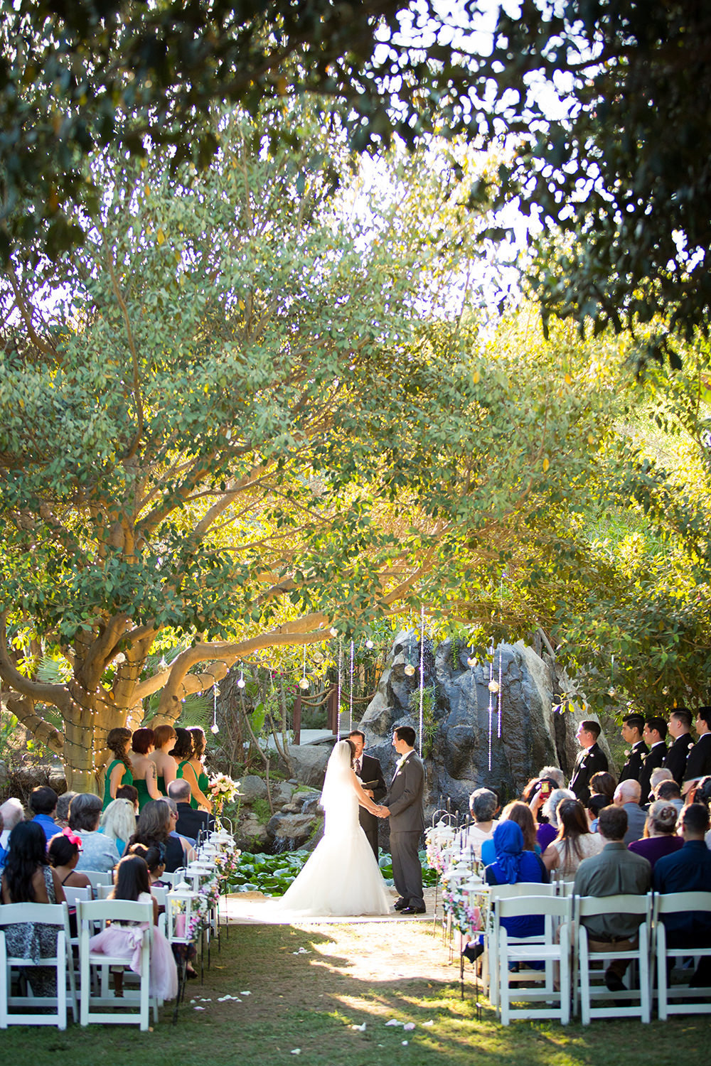 ceremony location with waterfall and trees