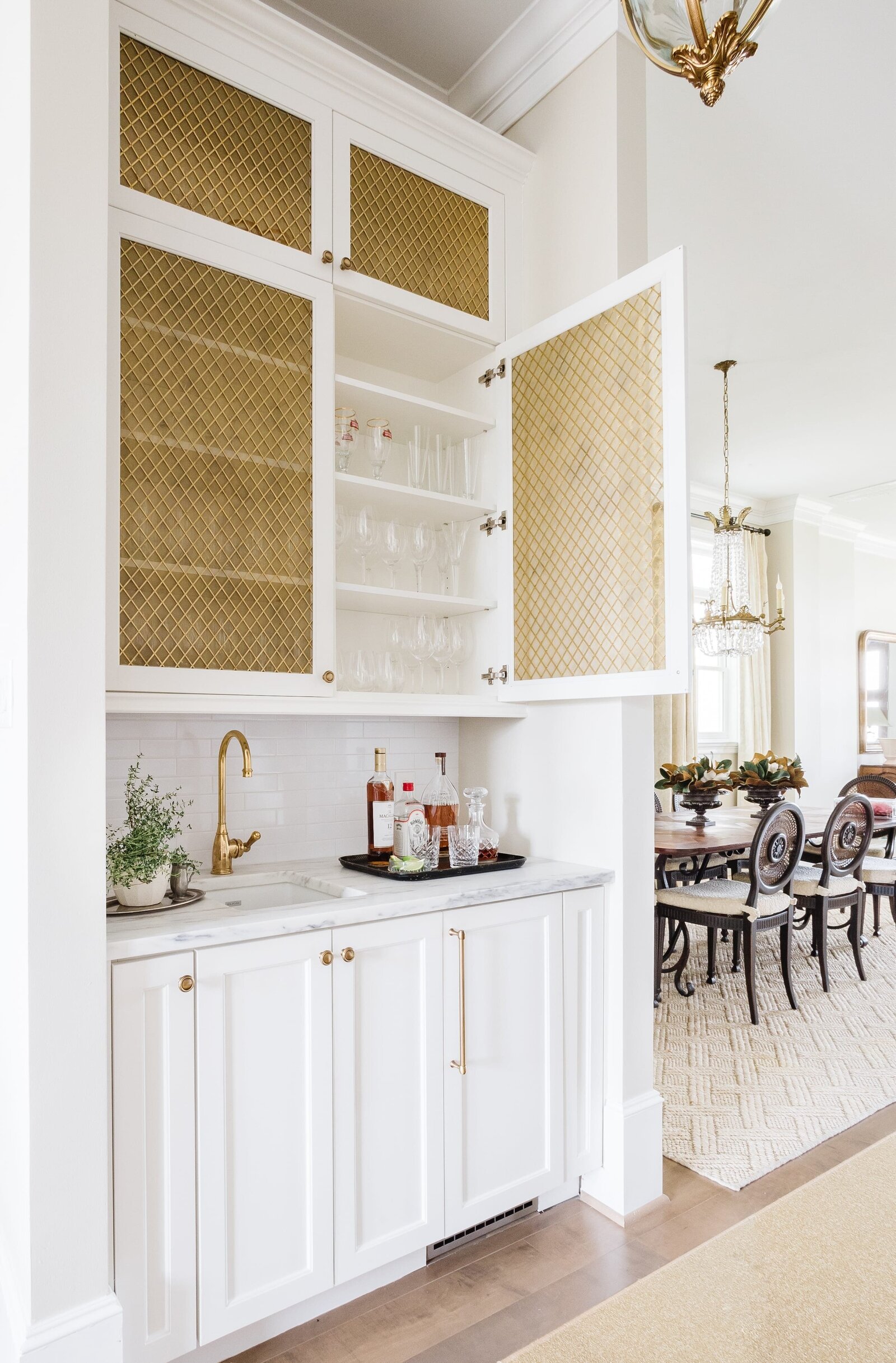 vision and hammer bar nook with white cabinets