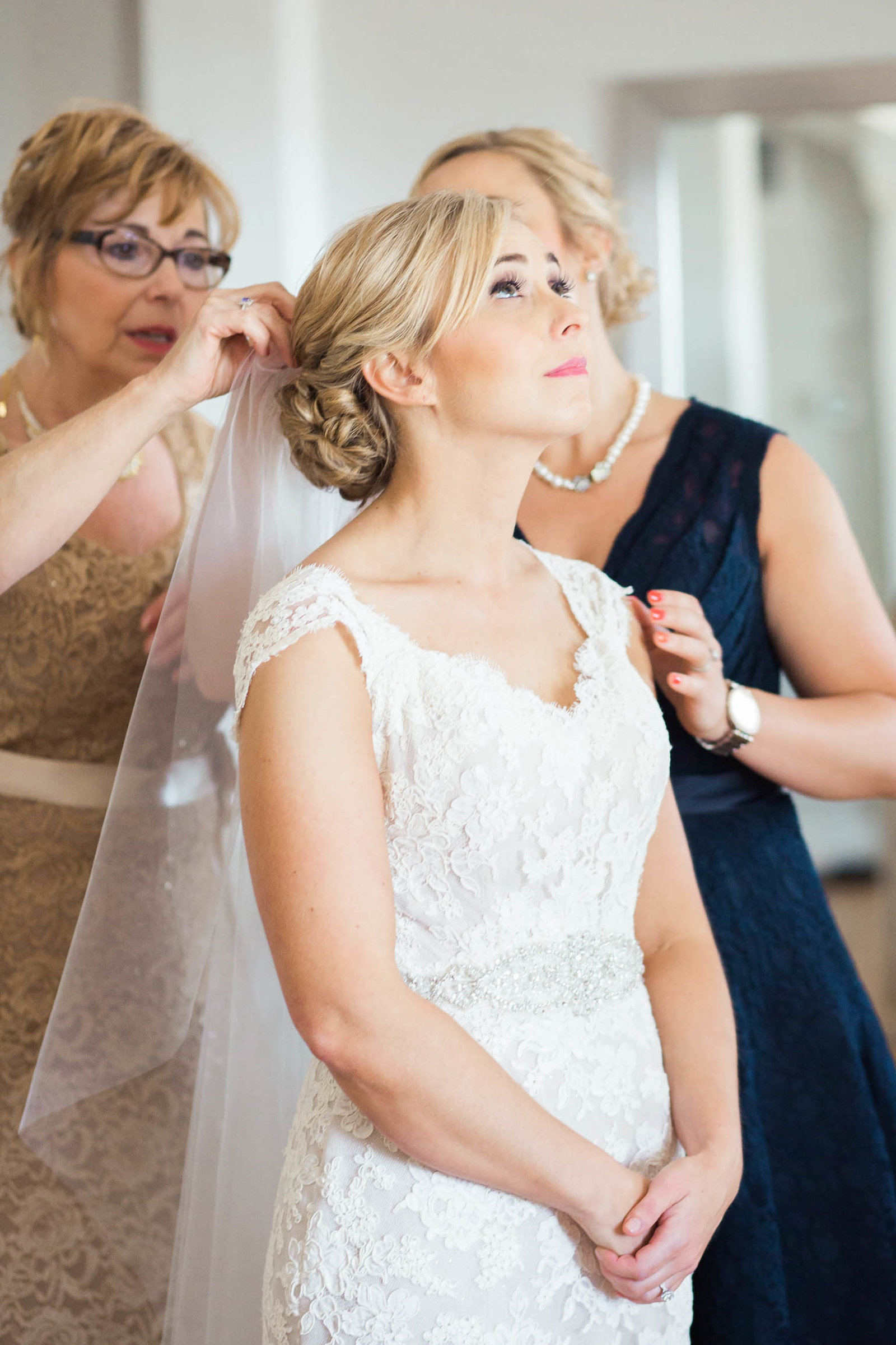 Bride gets into dress, Alhambra Hall, Mt Pleasant, South Carolina