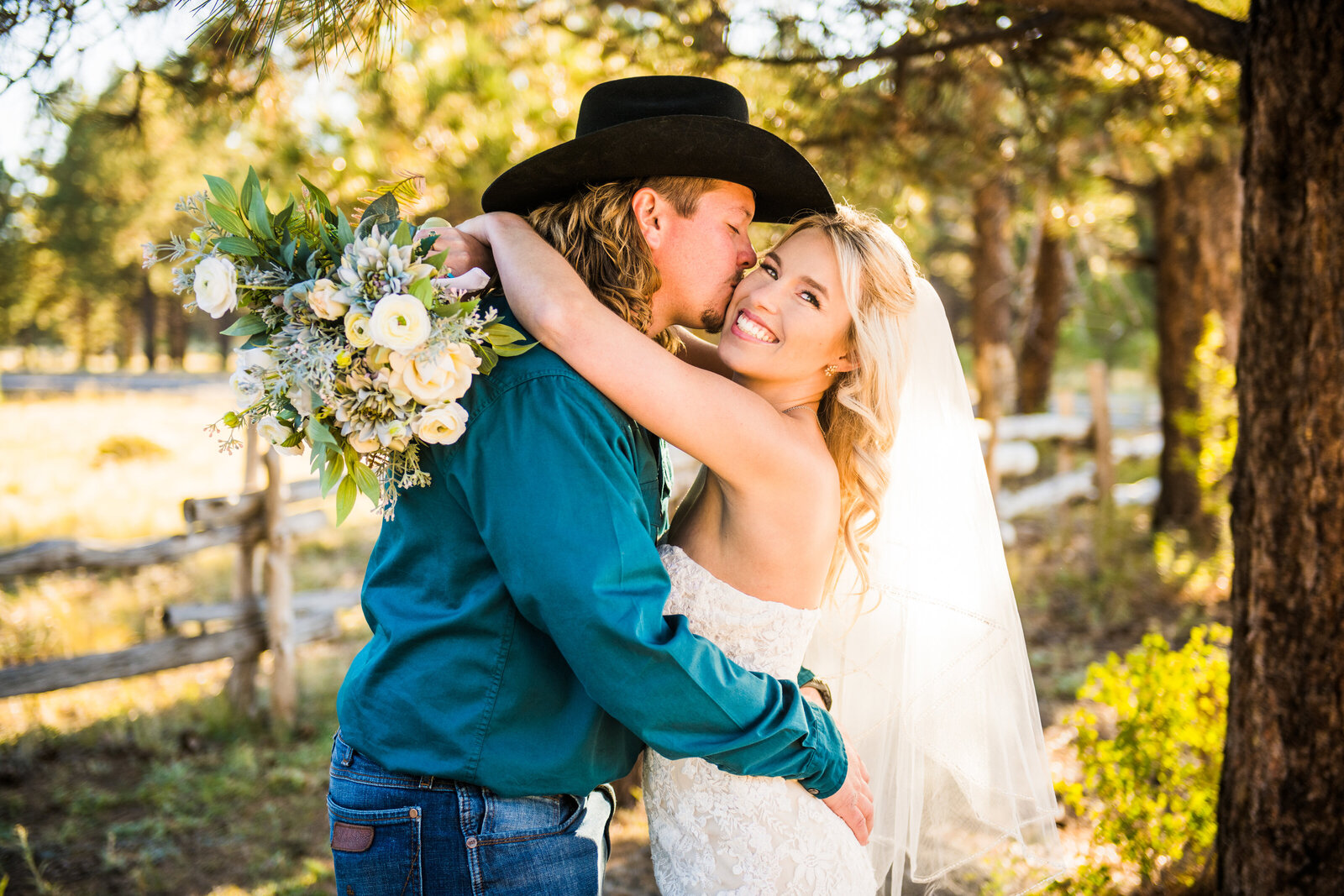 Country bride and groom kiss Flagstaff wedding photography