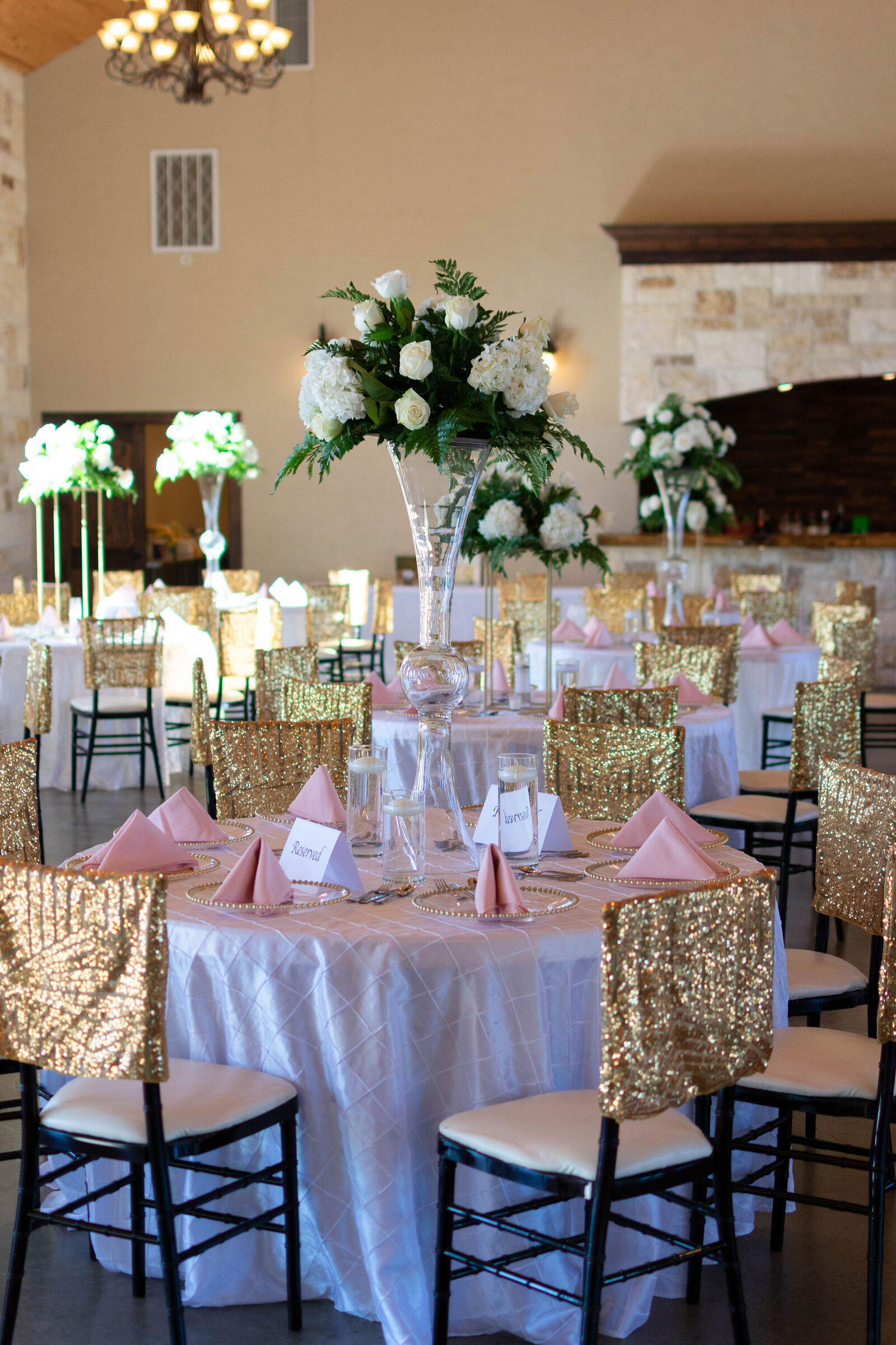 reception decor. sparkly gold and pink table scape