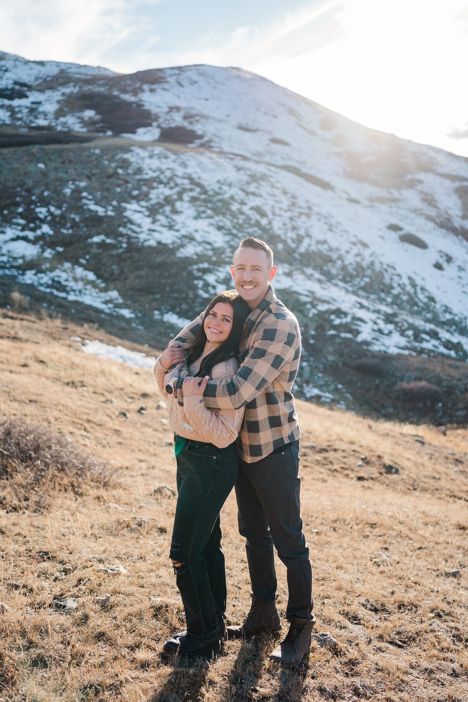 This candid photo of a Colorado couple perfectly captures the love and connection between them in the great outdoors.