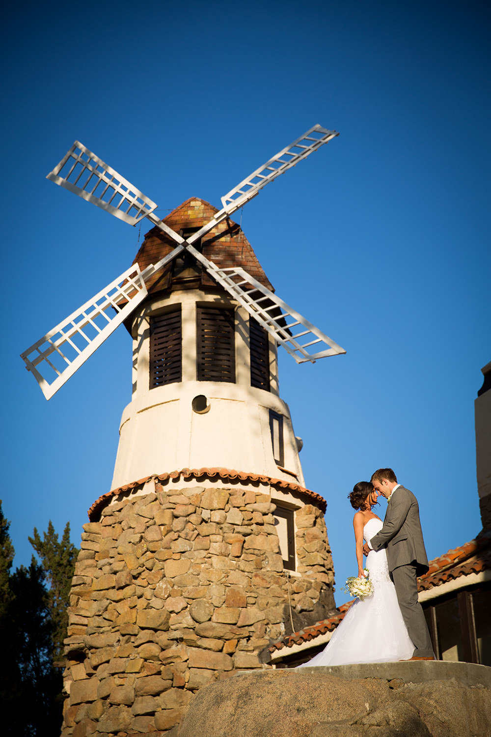 windmill with bride and groom