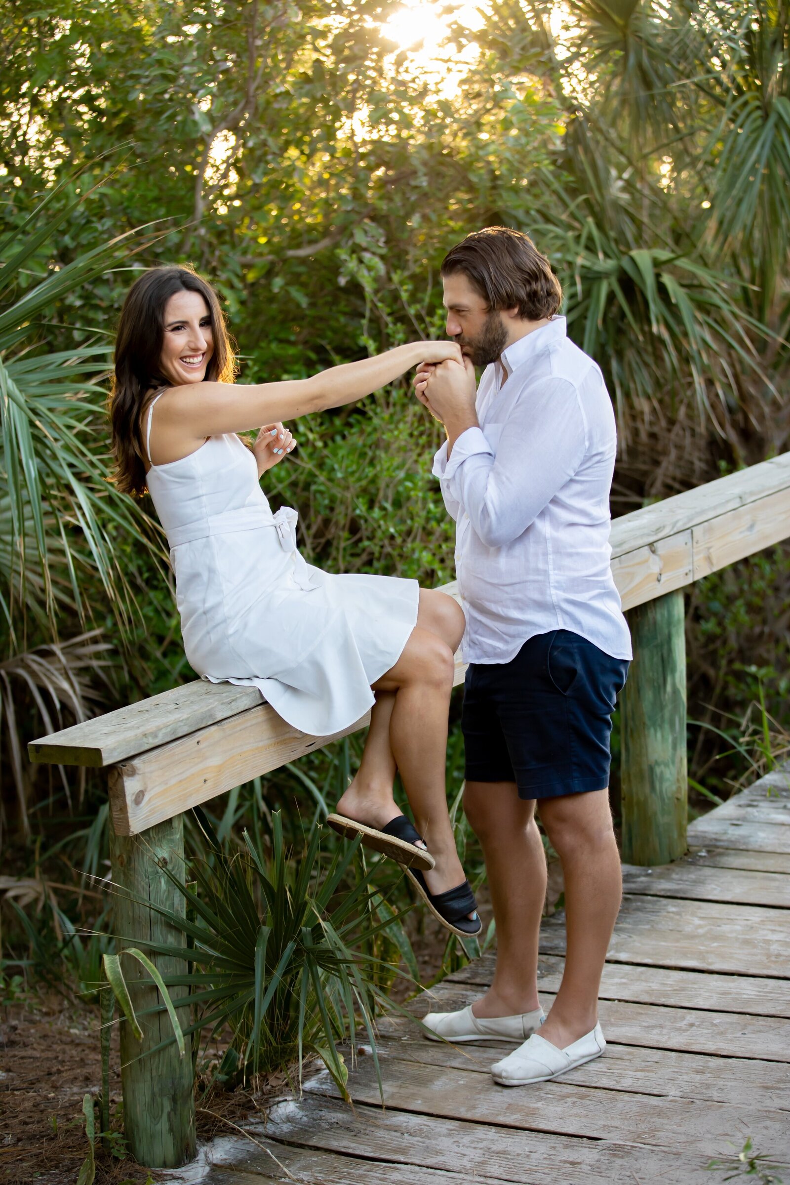 Couple at Bean Point Wooden walkway on Anna Maria Island