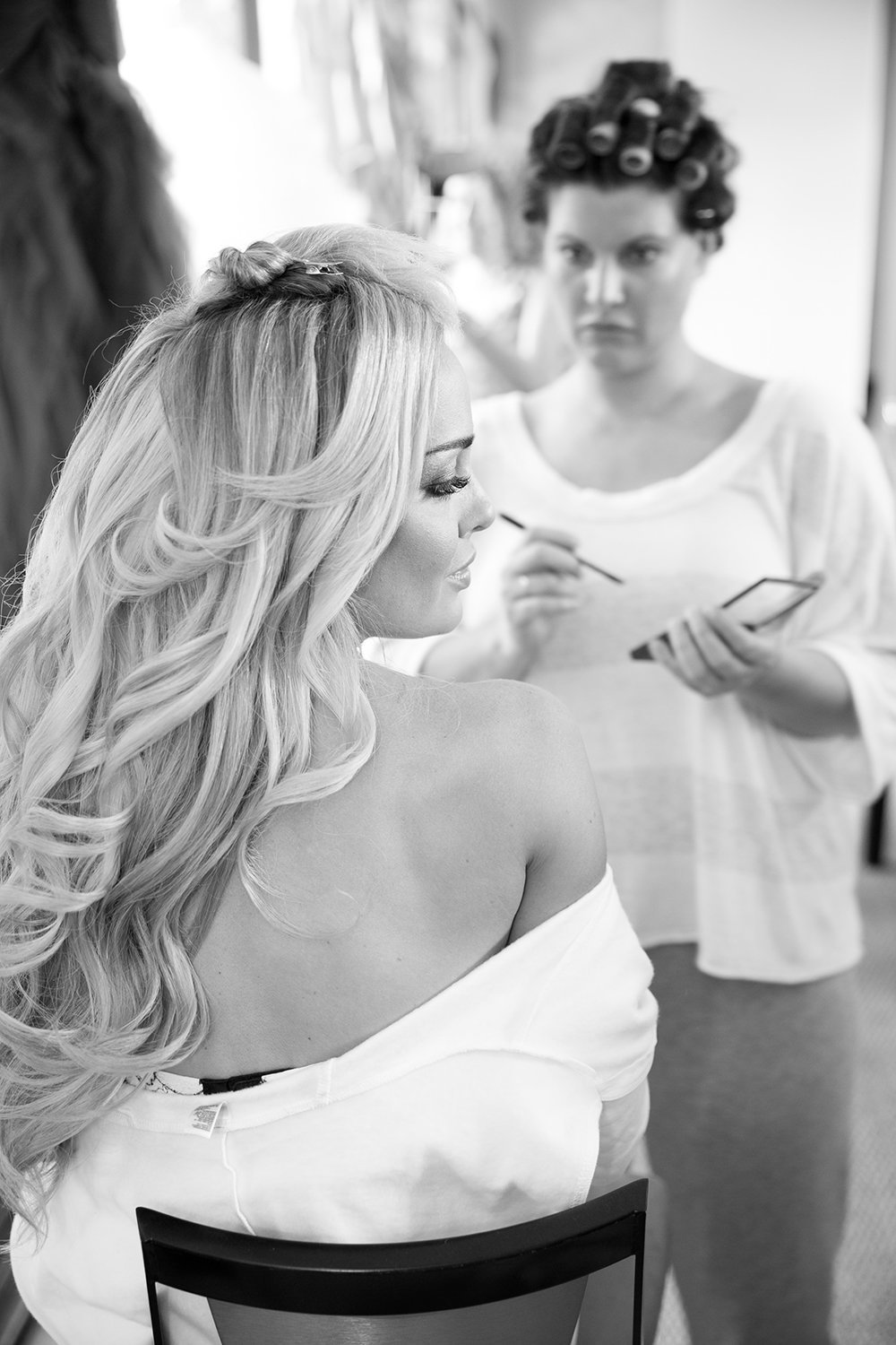 Lovely black and white moment while bride is getting ready