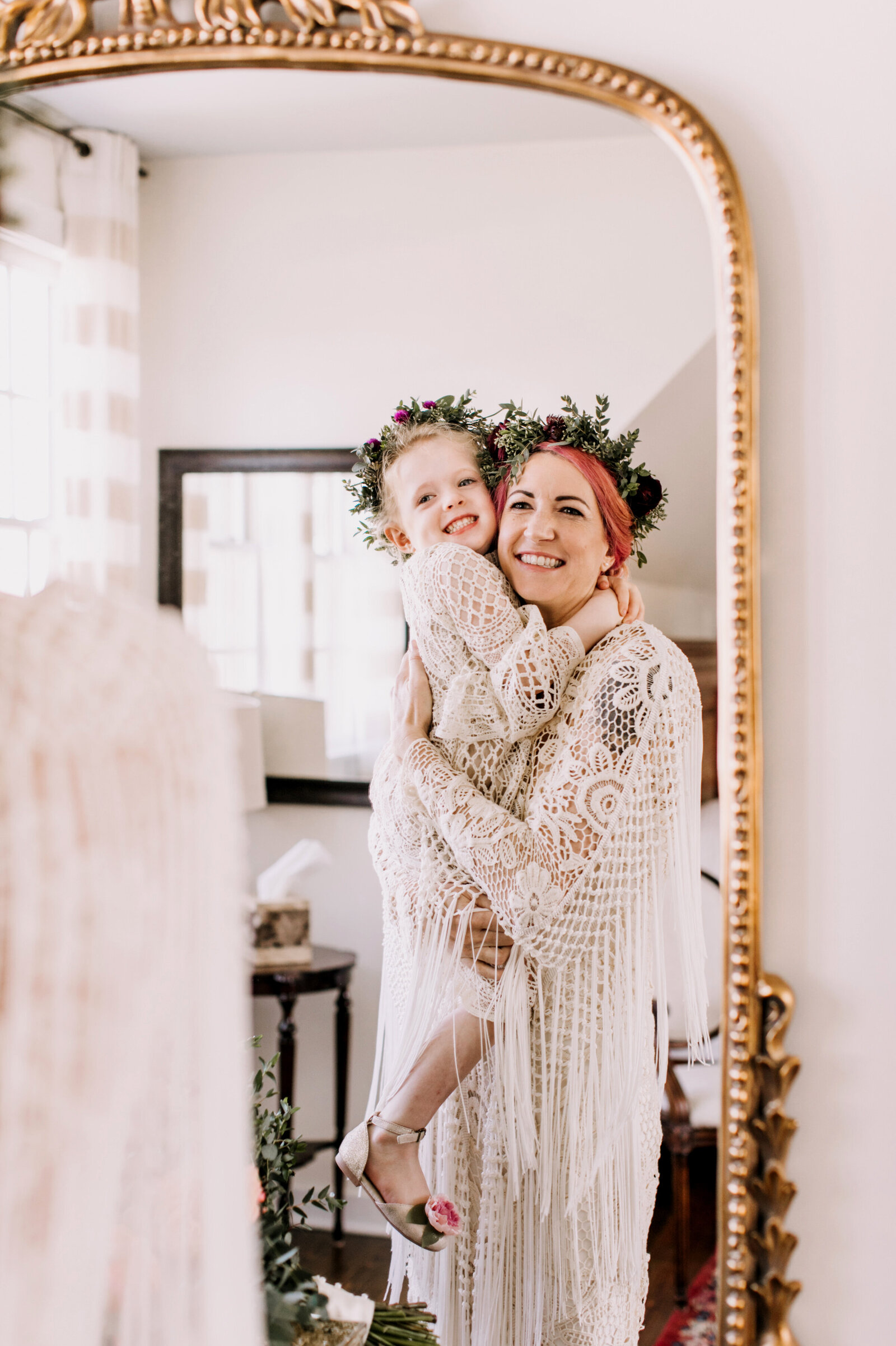 bride and daughter with flower crowns