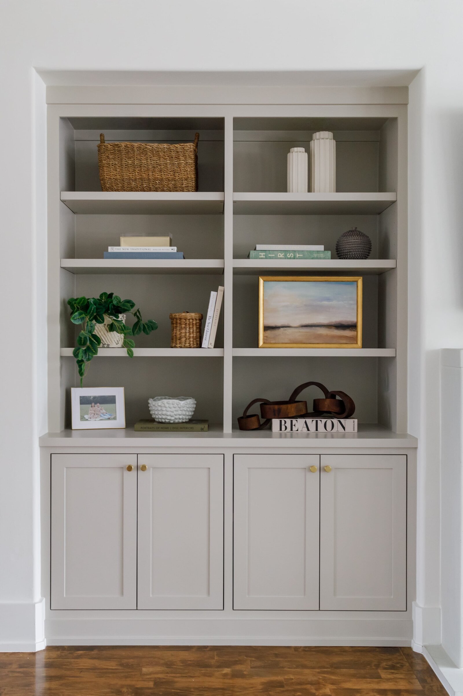 vision and hammer styling shelf with gold frame and wooden basket