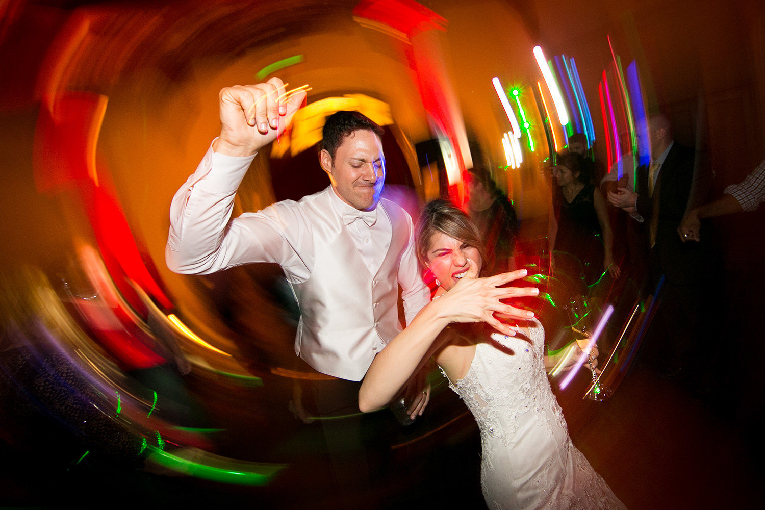 bride and groom dancing having fun don room