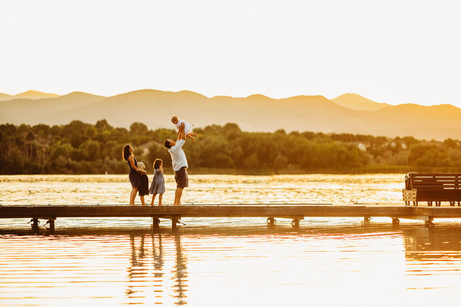 Family Photography, Family standing along a dock at sunset