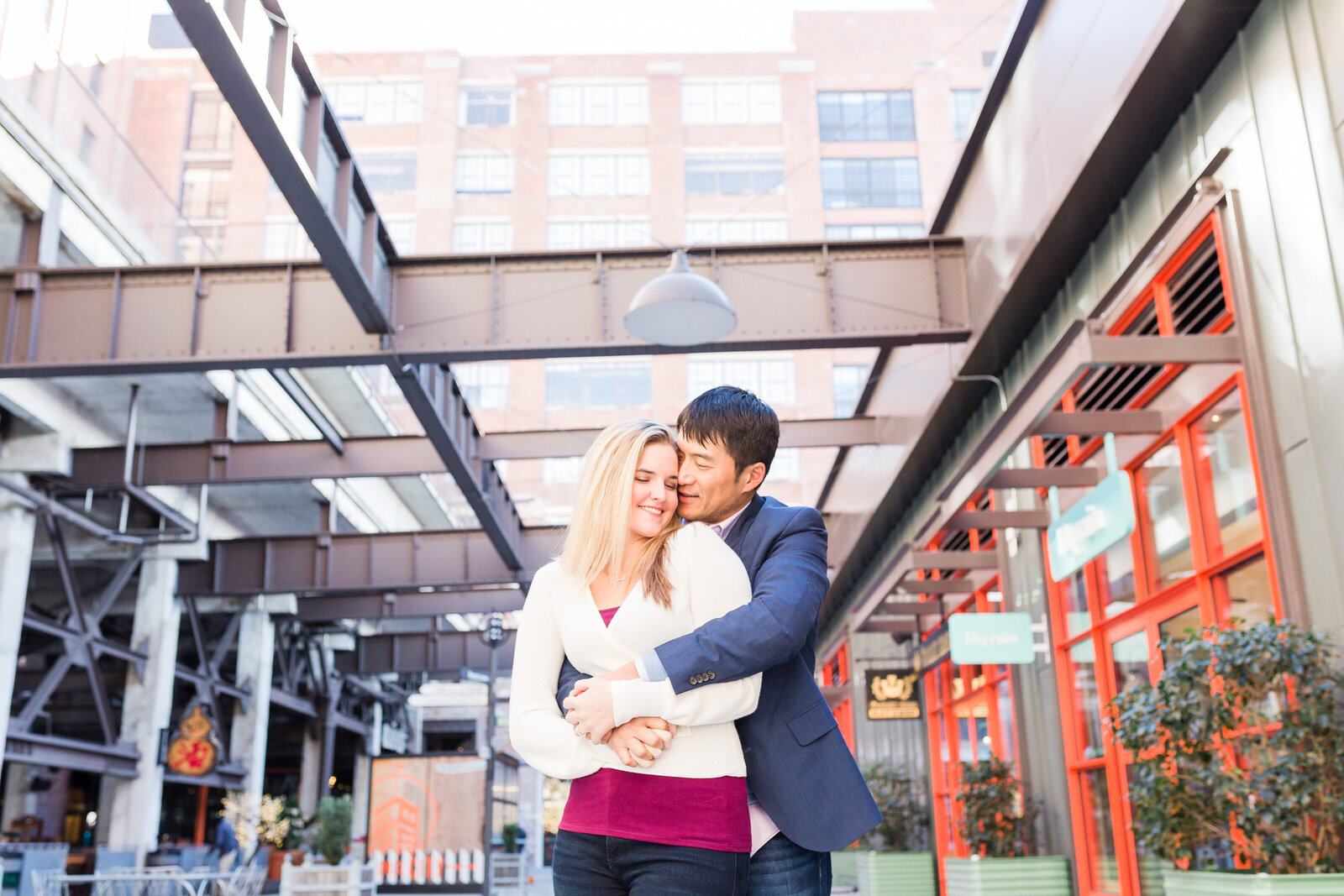 Couple posing at ponce city market entrance