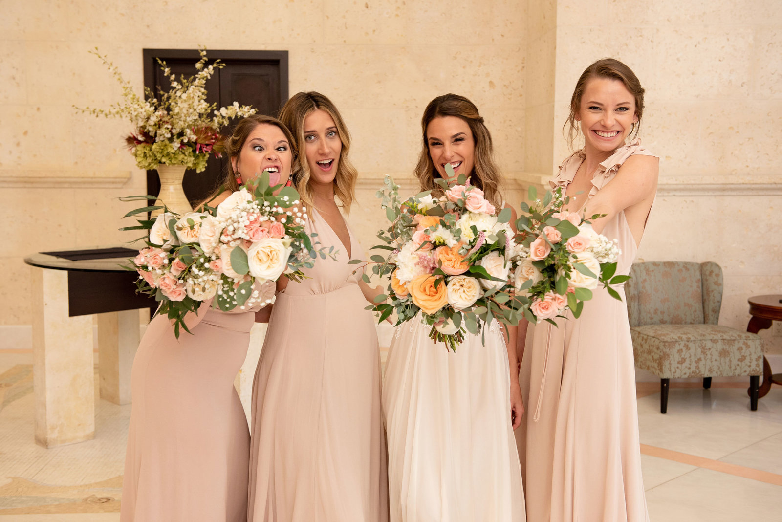 Bride and bridesmaids with bouquets at Atlantis Banquet and Events