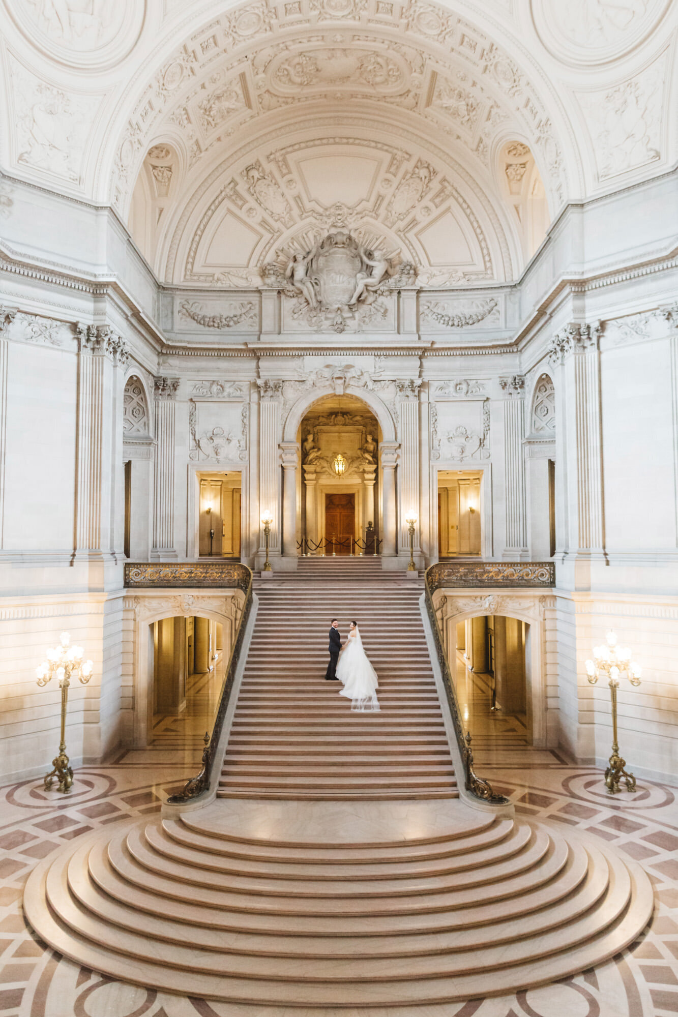 Grand Staircase shot with bride and groom