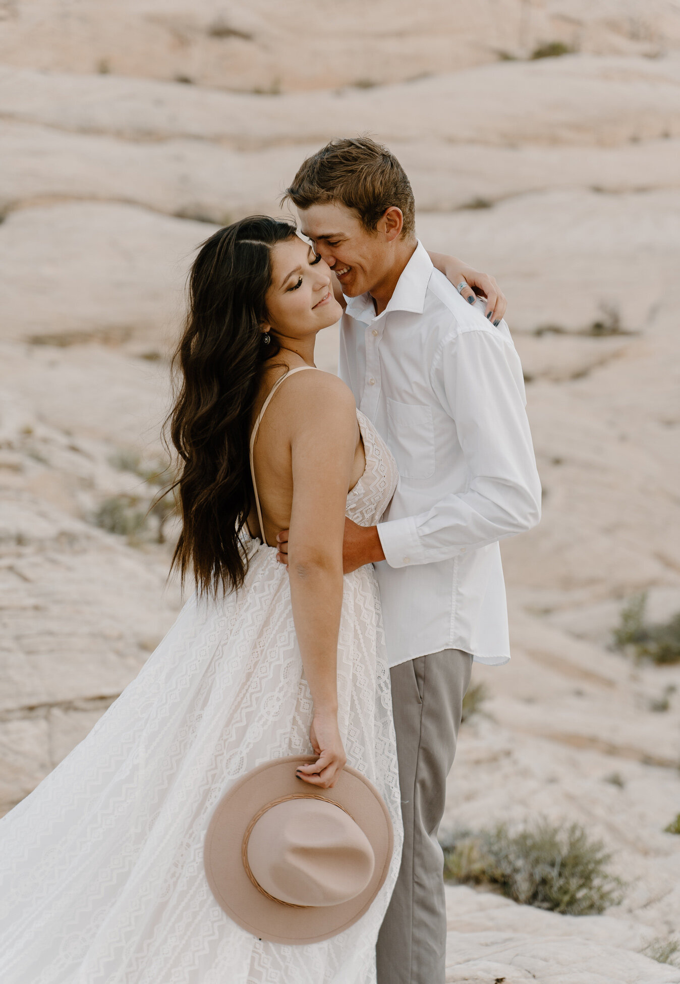 Sunrise elopement photography of a young couple in St. George, Utah