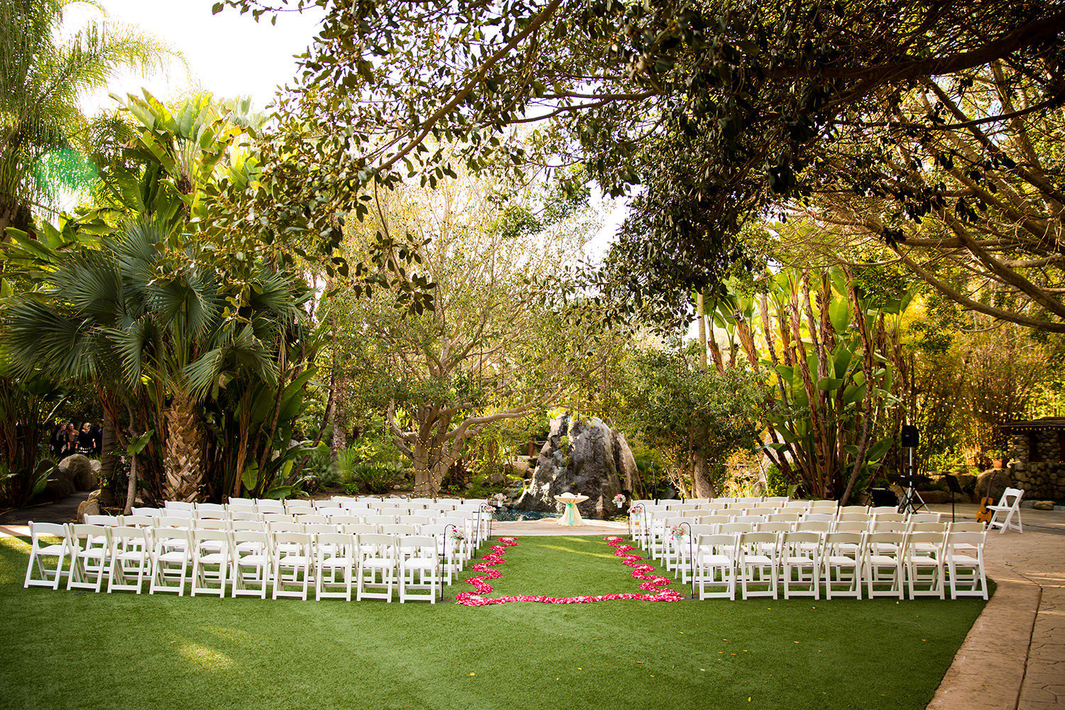 ceremony space with pink rose petals