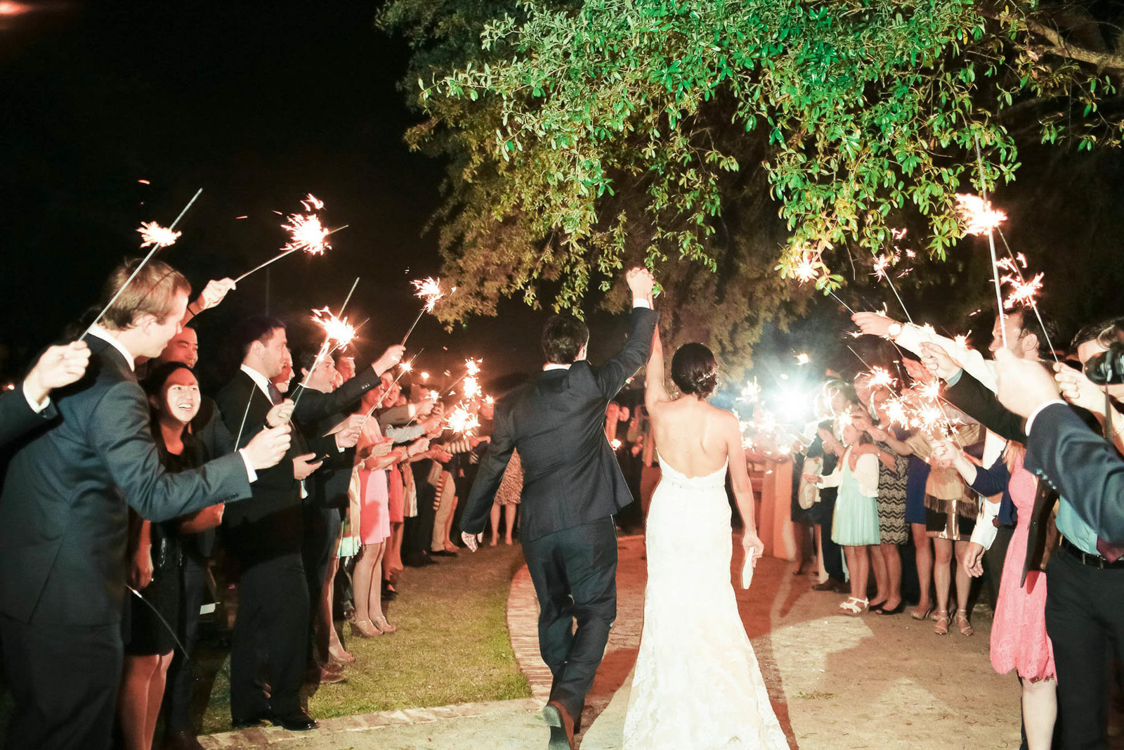 Bride and groom have sparkler exit, I'ON Creek Club, Mt Pleasant, South Carolina