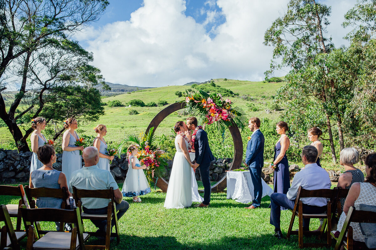 couples first kiss during their big island wedding